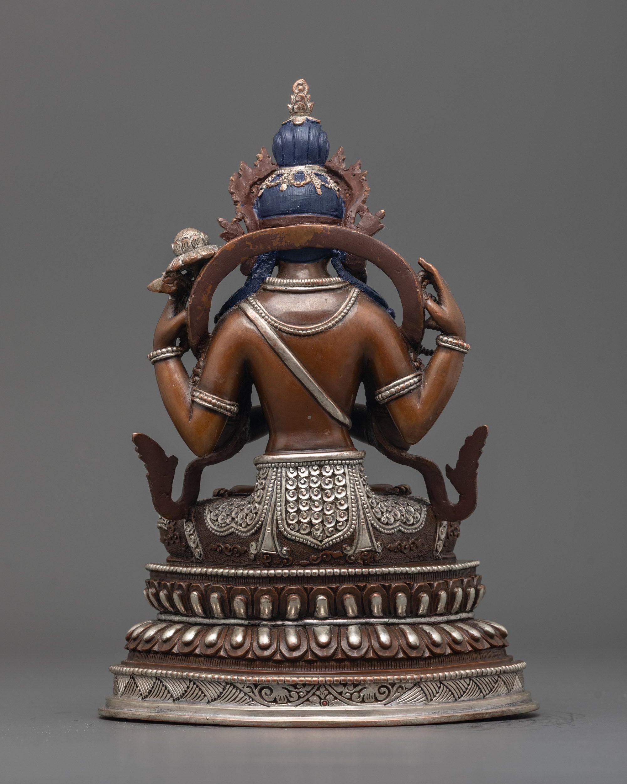 Back view of Chenrezig statue highlighting the hollow chamber feature
