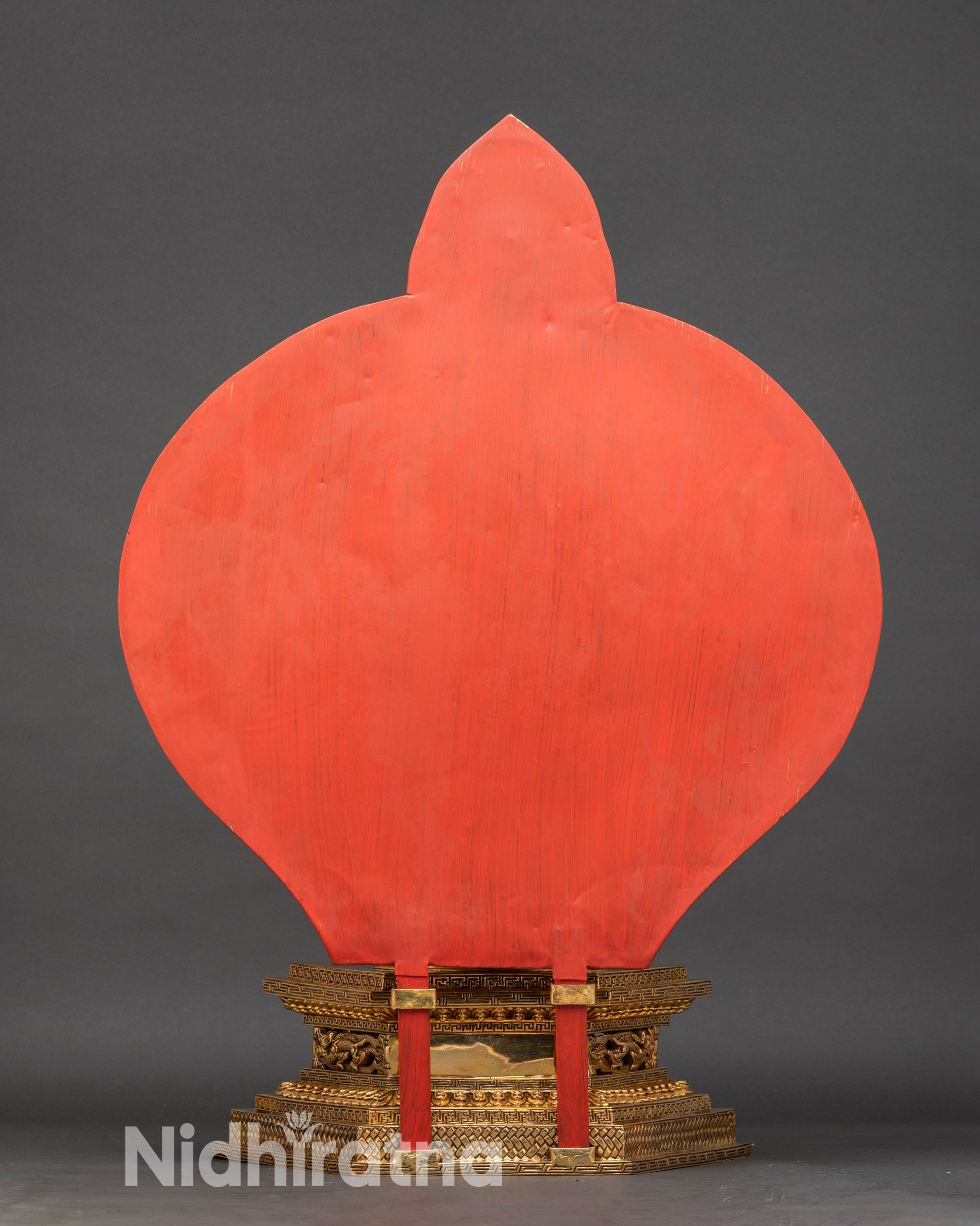 Back view of Chenrezig statue showing circular halo filigree, detailed arms, and ornate multi-tiered pedestal, handcrafted Nepalese Buddhist art