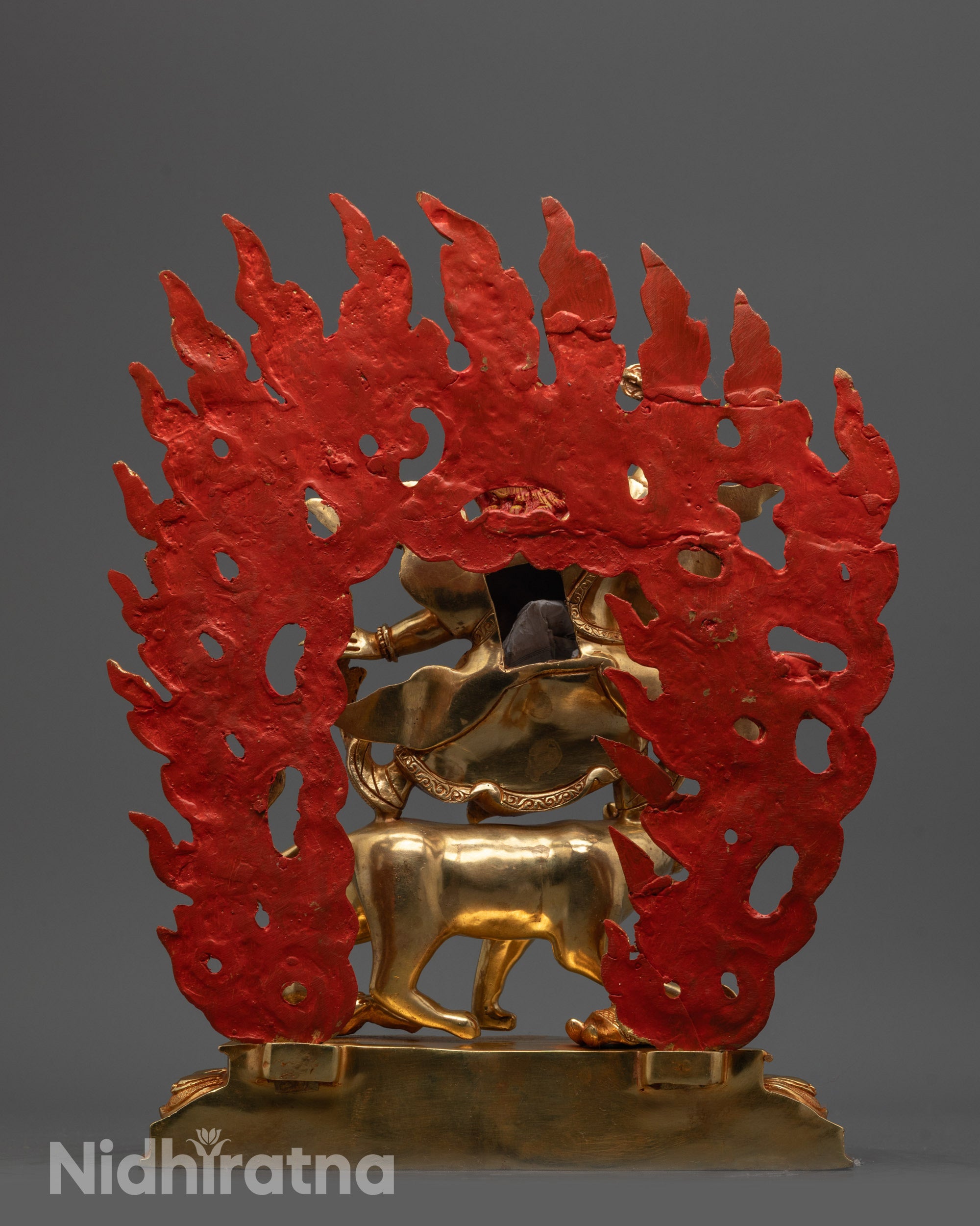 Back view of Dorje Drolo statue highlighting detailed carvings and Flames of Halo effect