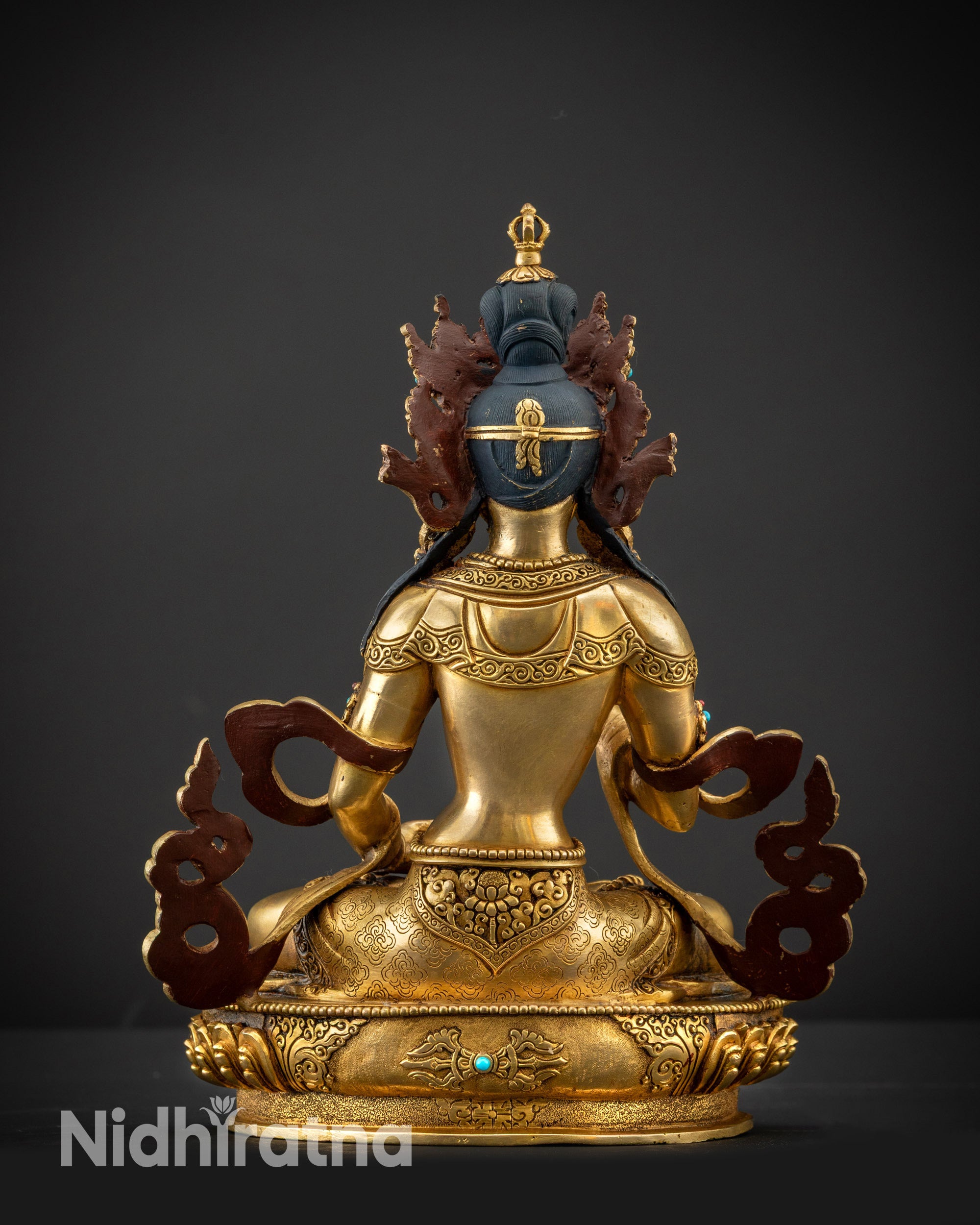 Back view of Dorje Sempa Statue with intricate carved lower garment and gold-gilded finish