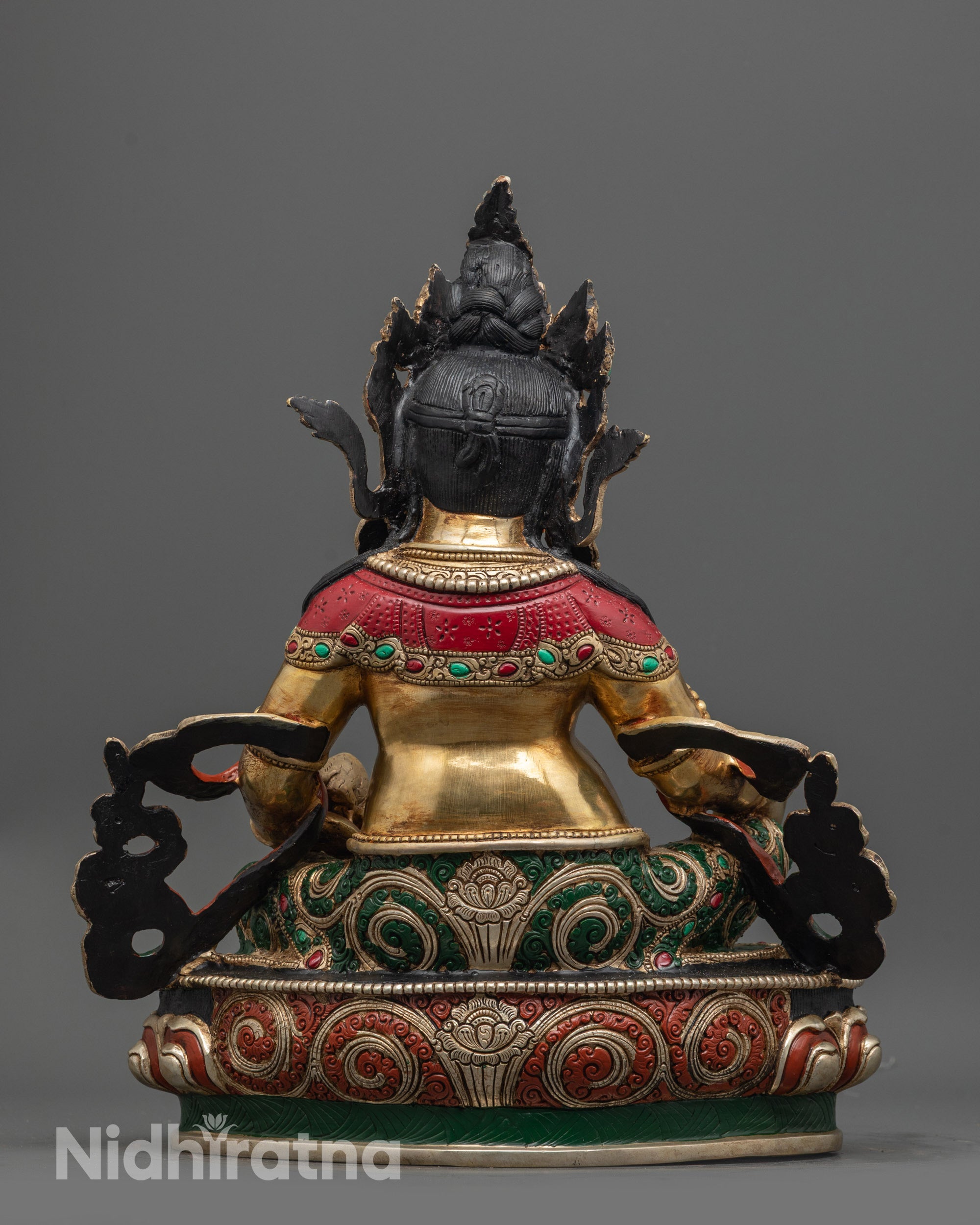 Back view of Dzambhala Statue highlighting detailed robe, lotus seat, and gold fire-gilded finish