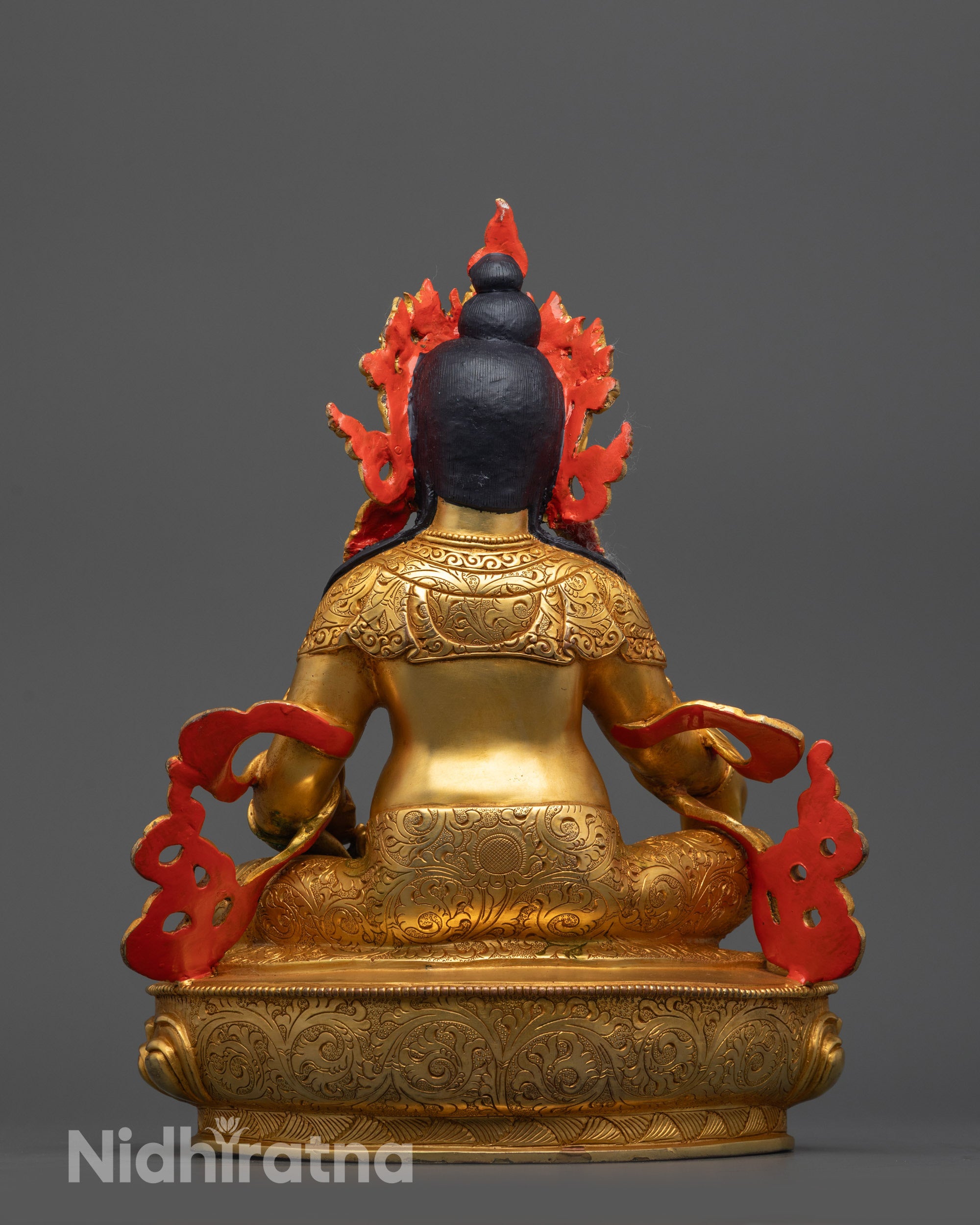 Back view of Dzambhala Statue highlighting gold fire-gilded body and detailed patterns