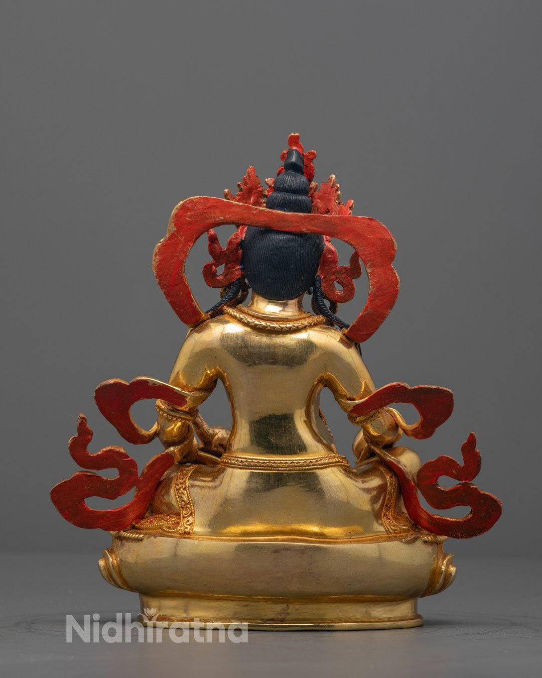 Back view of Dzambhala statue highlighting detailed craftsmanship by Master Artisan Nepal