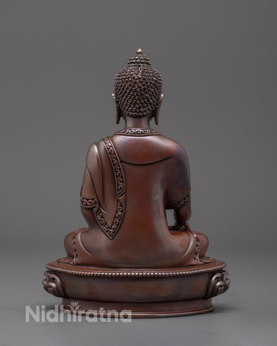 Back view of Gautama Buddha statue highlighting handcrafted textures
