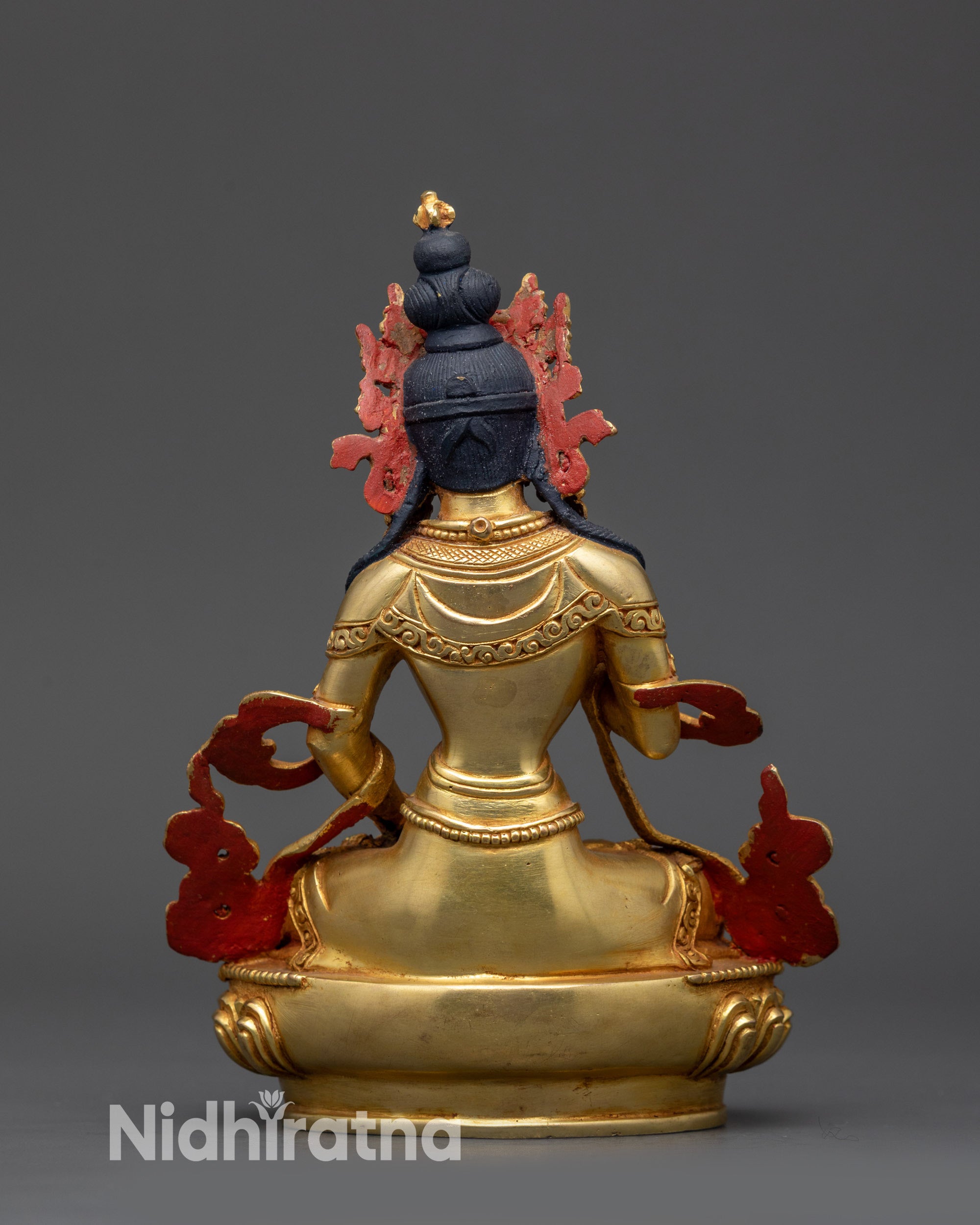 Back view of Gold-Gilded Vajrasattva, ornate robes and serene Himalayan sculpture details