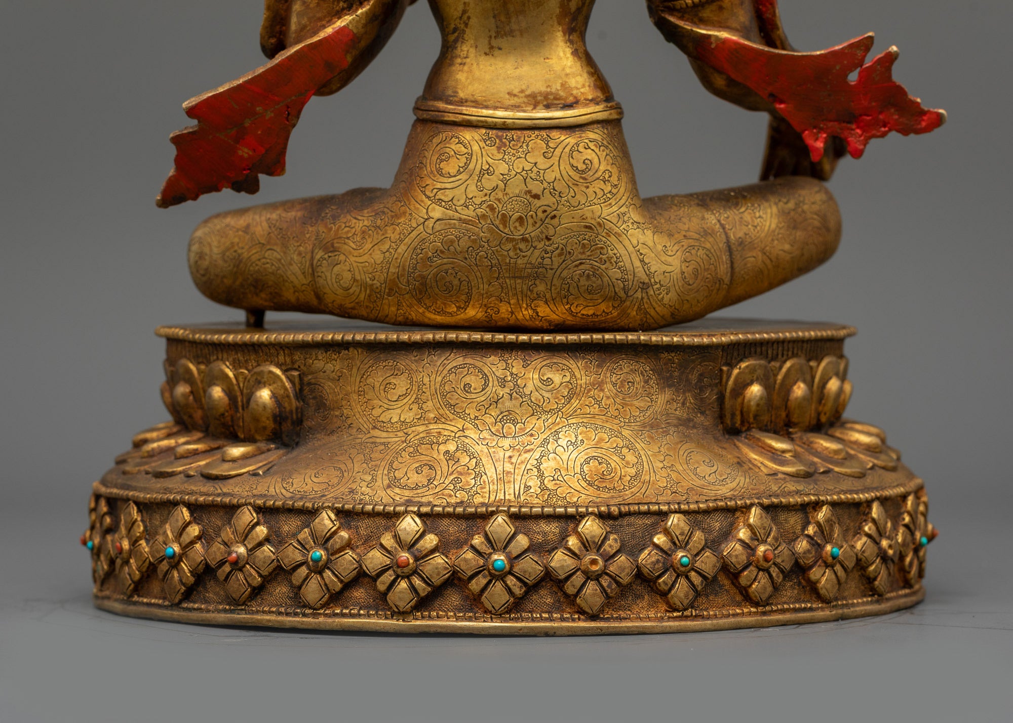 Back view of Green Tara with five-jeweled crown and flowing robes