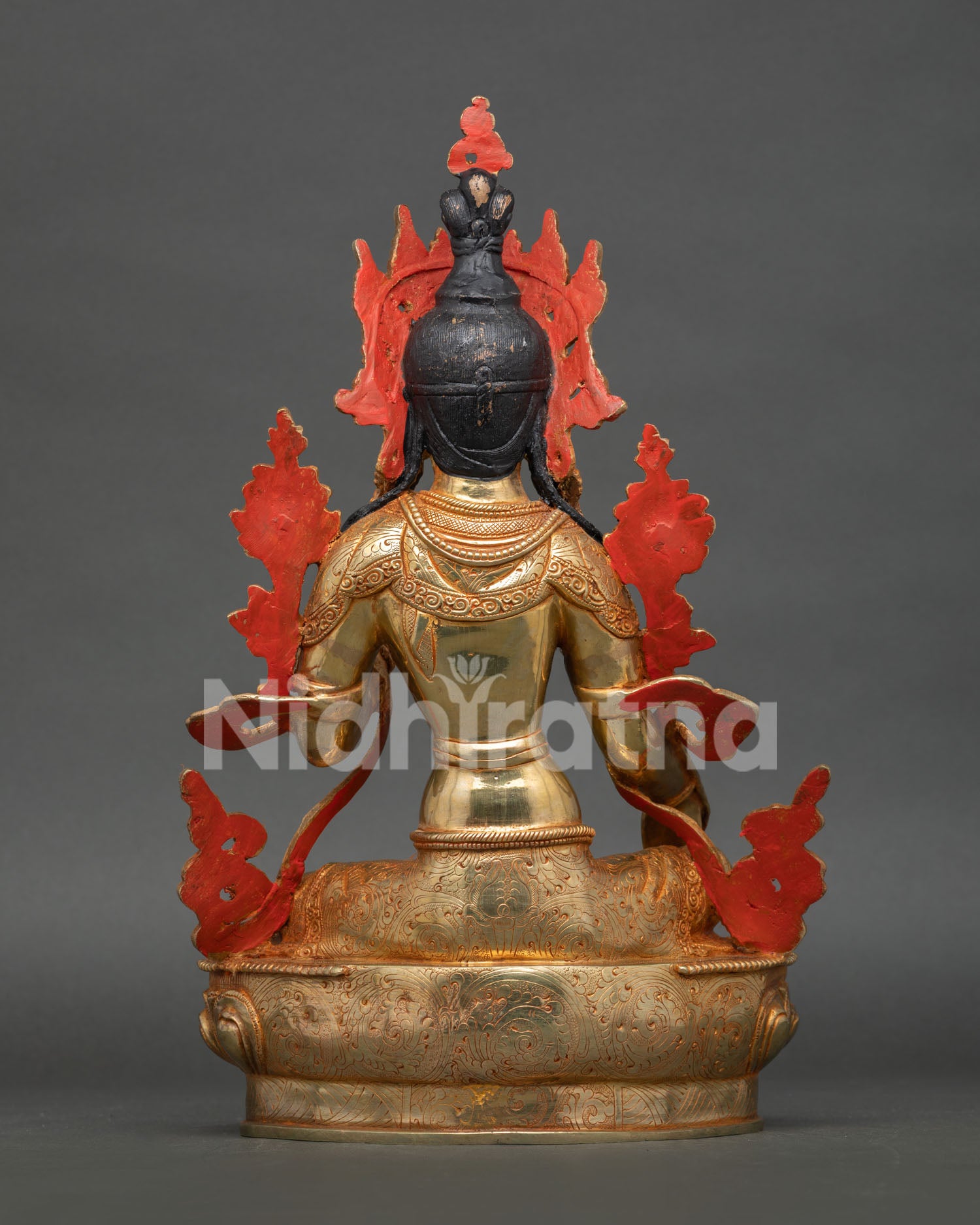 back-view-of-green-tara-statue-showing-detailed-craftsmanship-and-lotus-pedestal