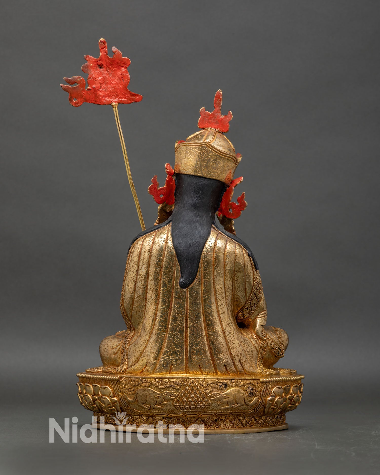 guru-norlha-statue-back-view-detailed-lotus-base-robe-patterns