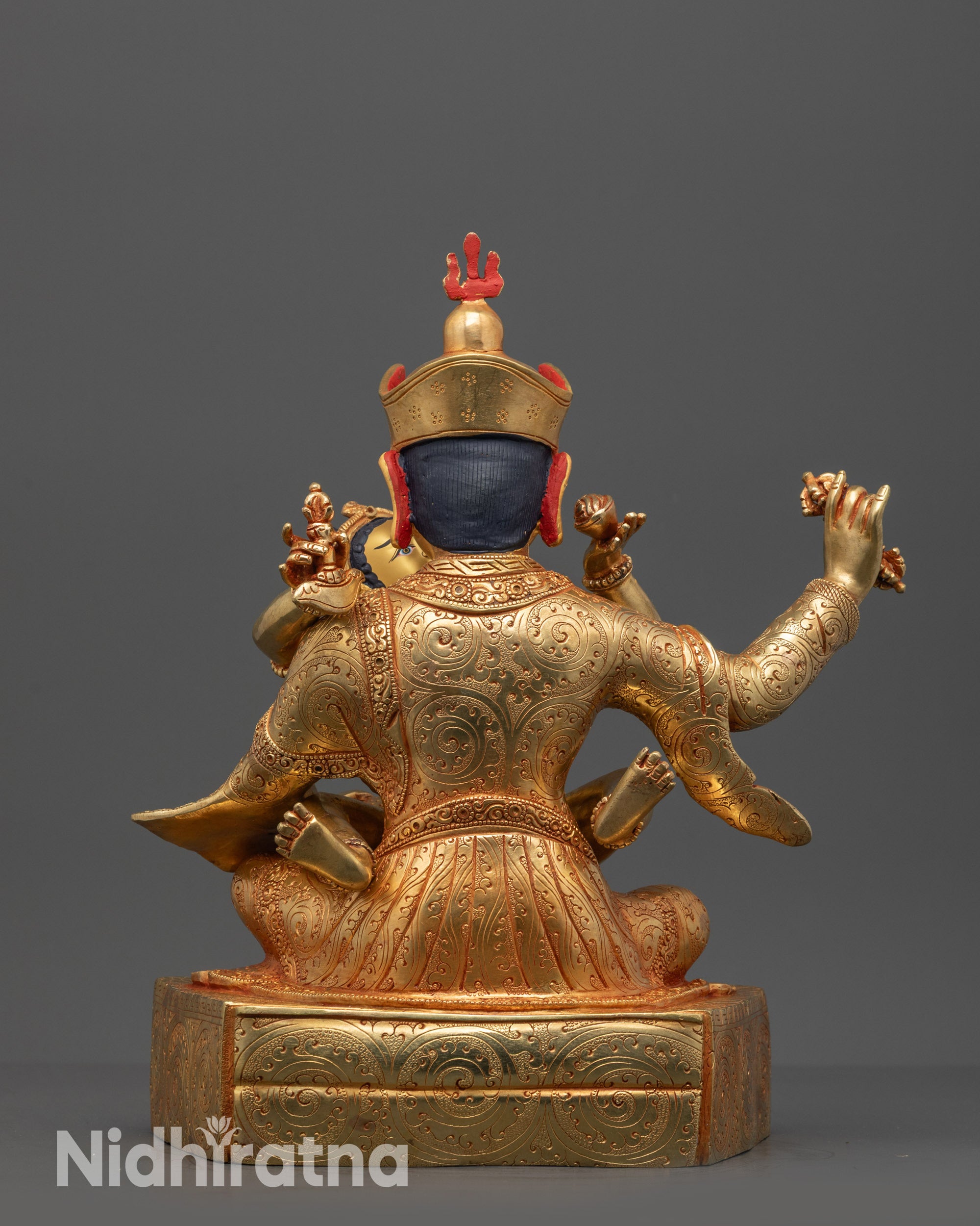 Back view of Guru Rinpoche Consort Statue with intricately carved robes and jewelry