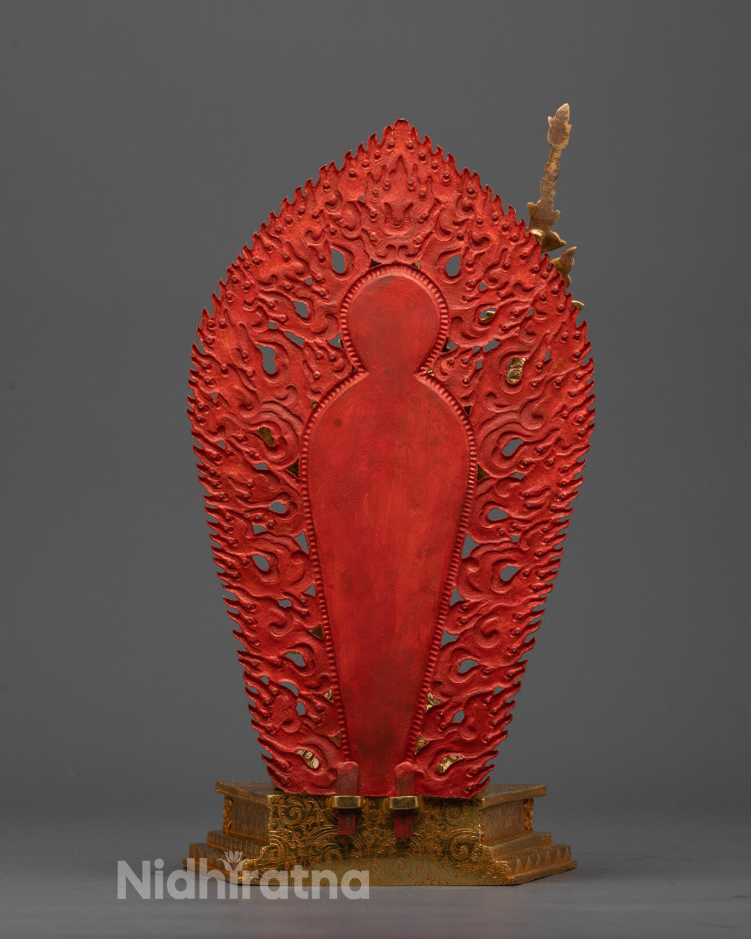 Back view of Guru Rinpoche statue highlighting carved halo and detailed garments