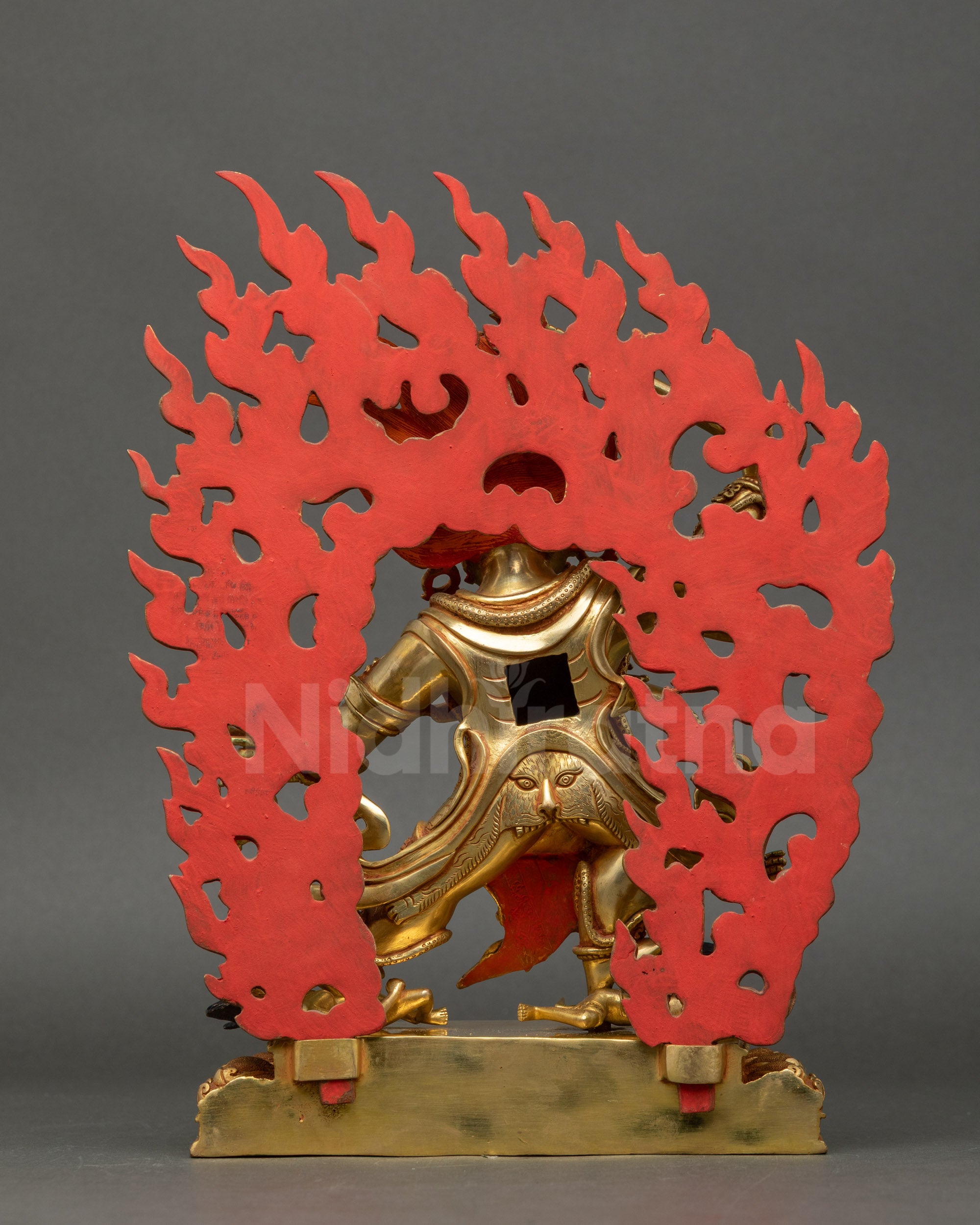 Back view of Hayagriva Statue with intricate 3D carvings and lotus base