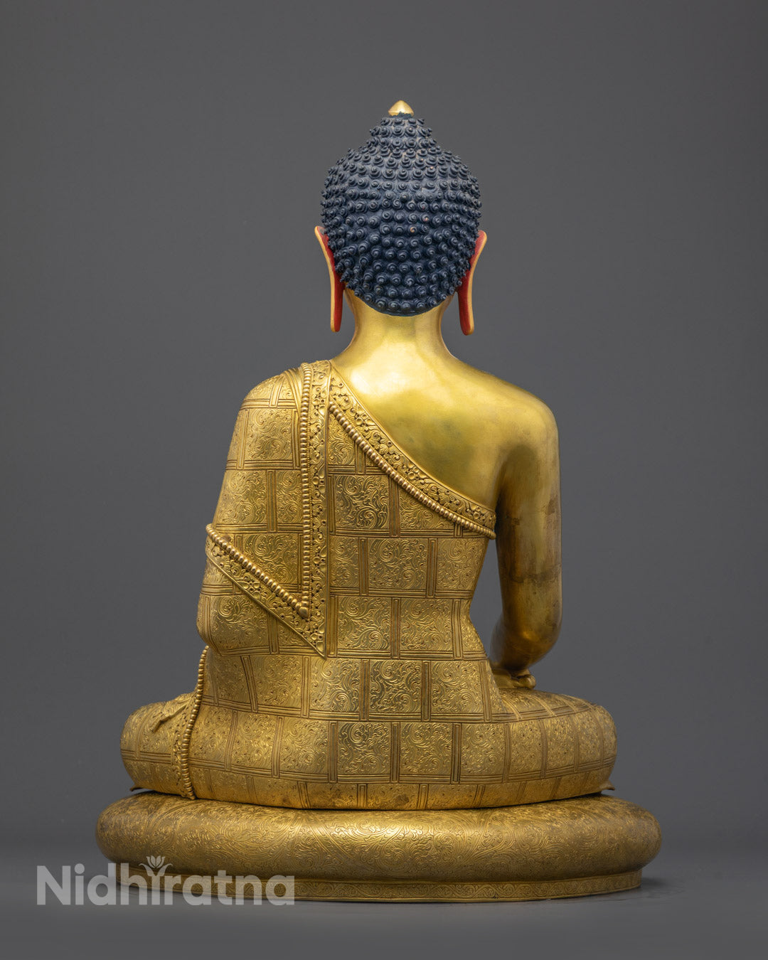 Back view of Himalayan Shakyamuni Buddha Statue with ornate robe design