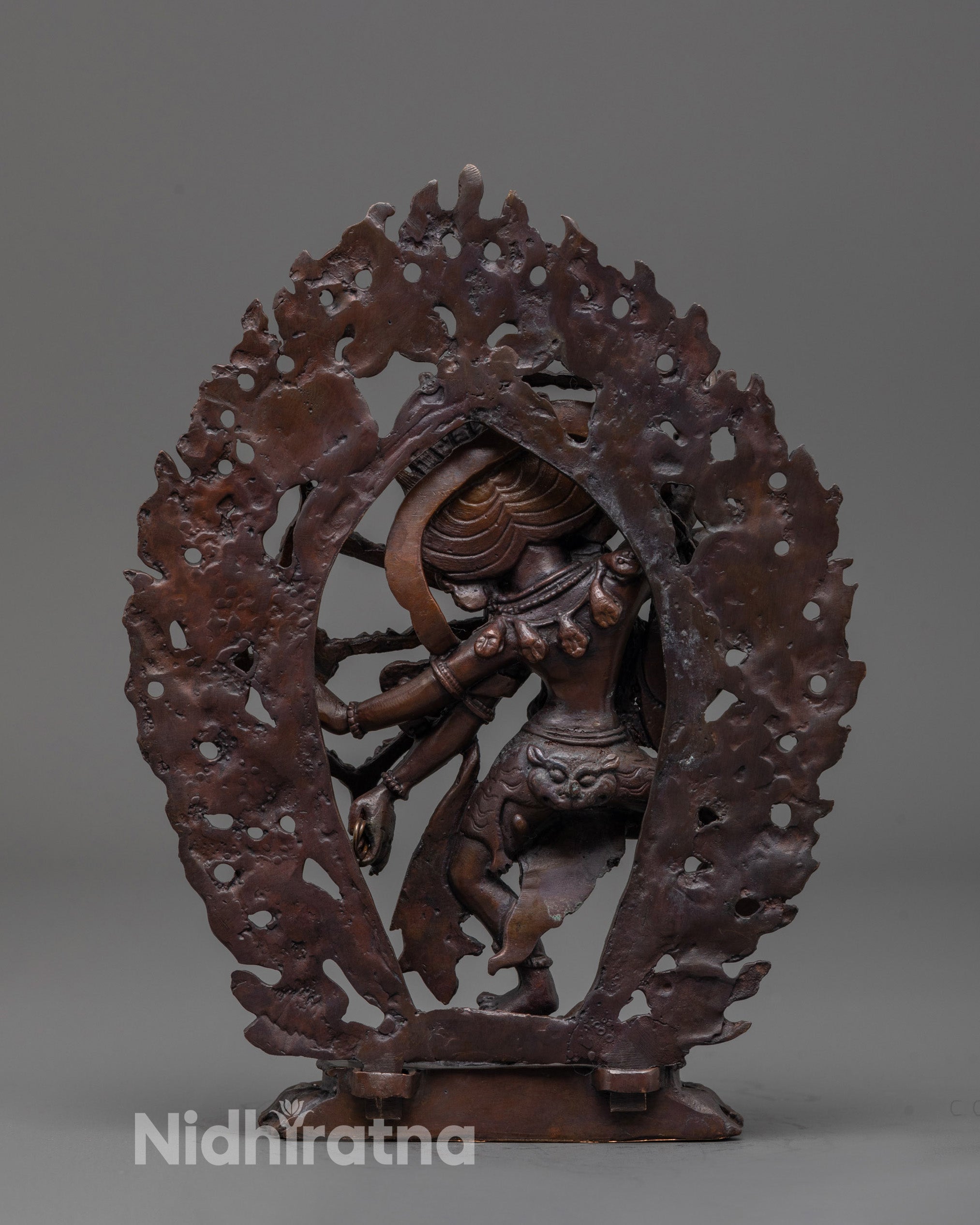 Back view of Kurukulla Statue highlighting radiant halo and intricate craftsmanship