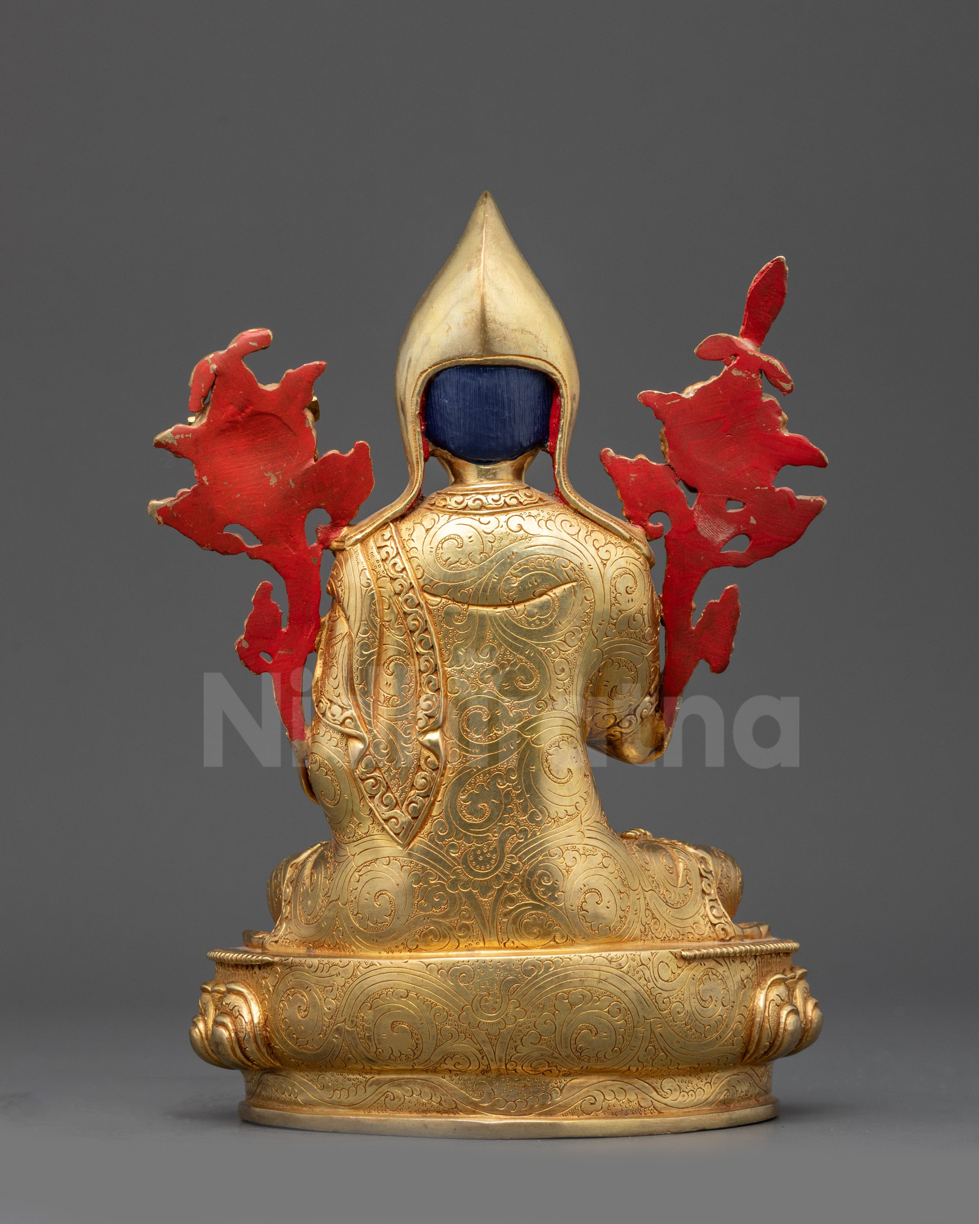 Back view of Longchenpa statue showing detailed carved robe and lotus throne