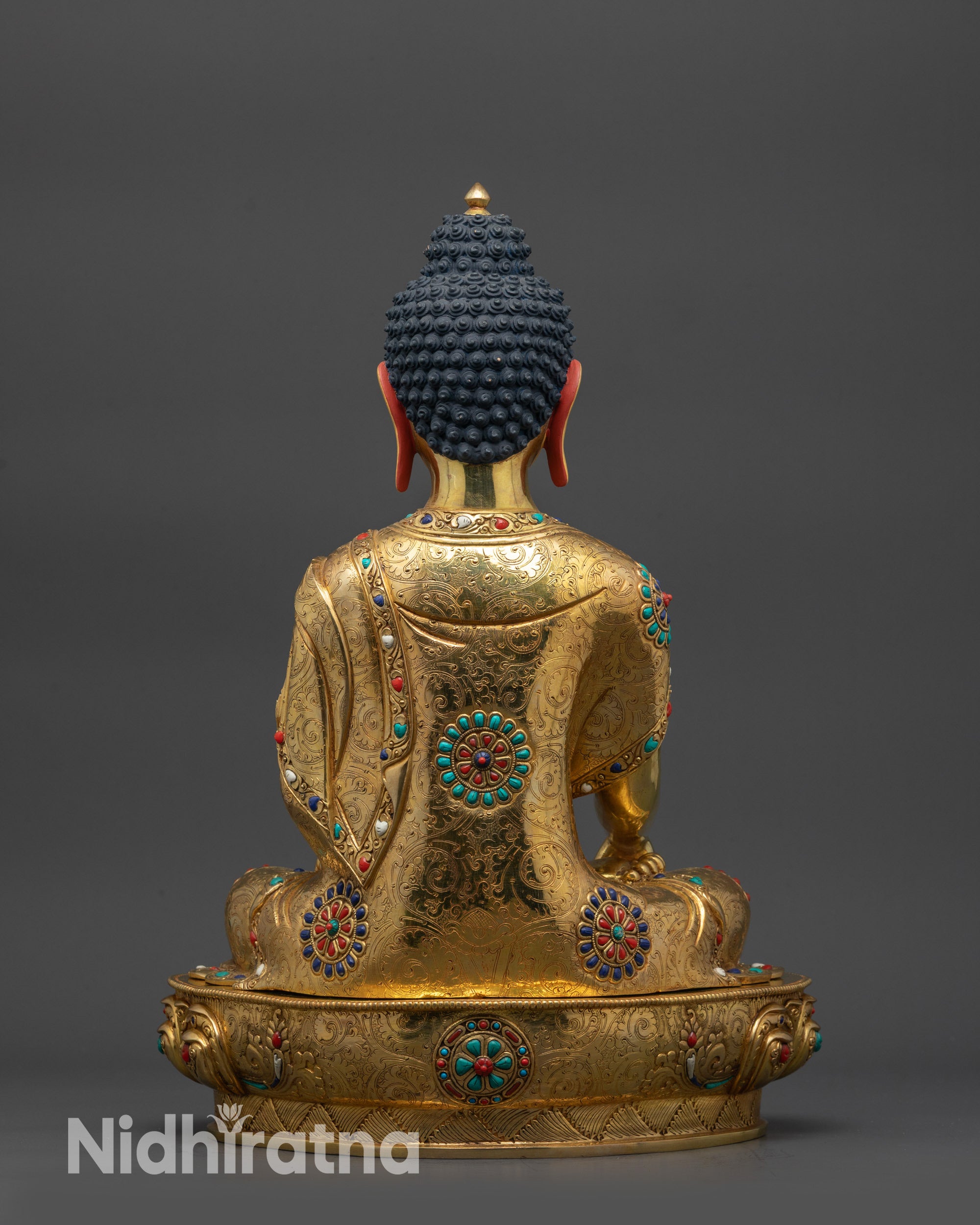 Back view of Lord Gautama Buddha Statue showing detailed monk’s robe craftsmanship