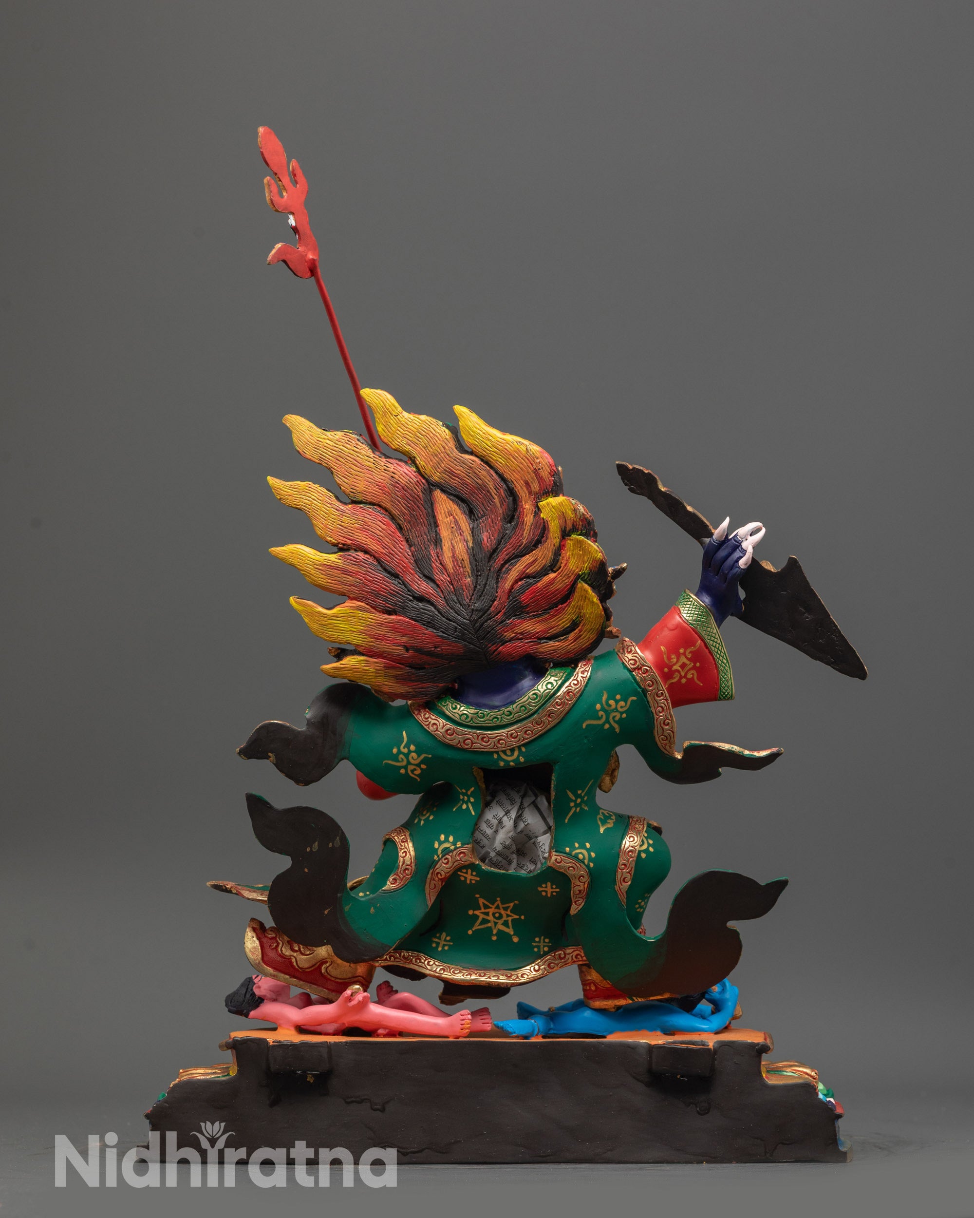 Back view of Mahakala Bernagchen showing intricate carvings and vibrant colors