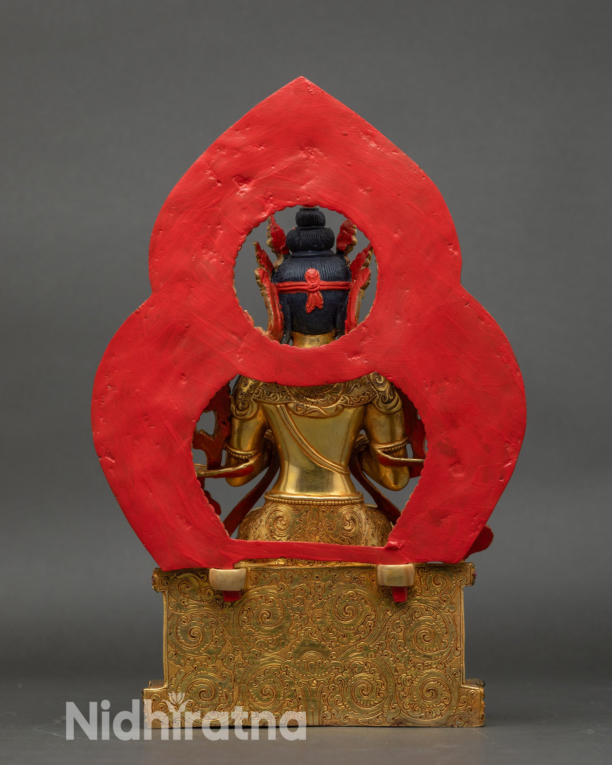 Back view of Maitreya Buddha sculpture, detailed halo, lion throne, and lotus base