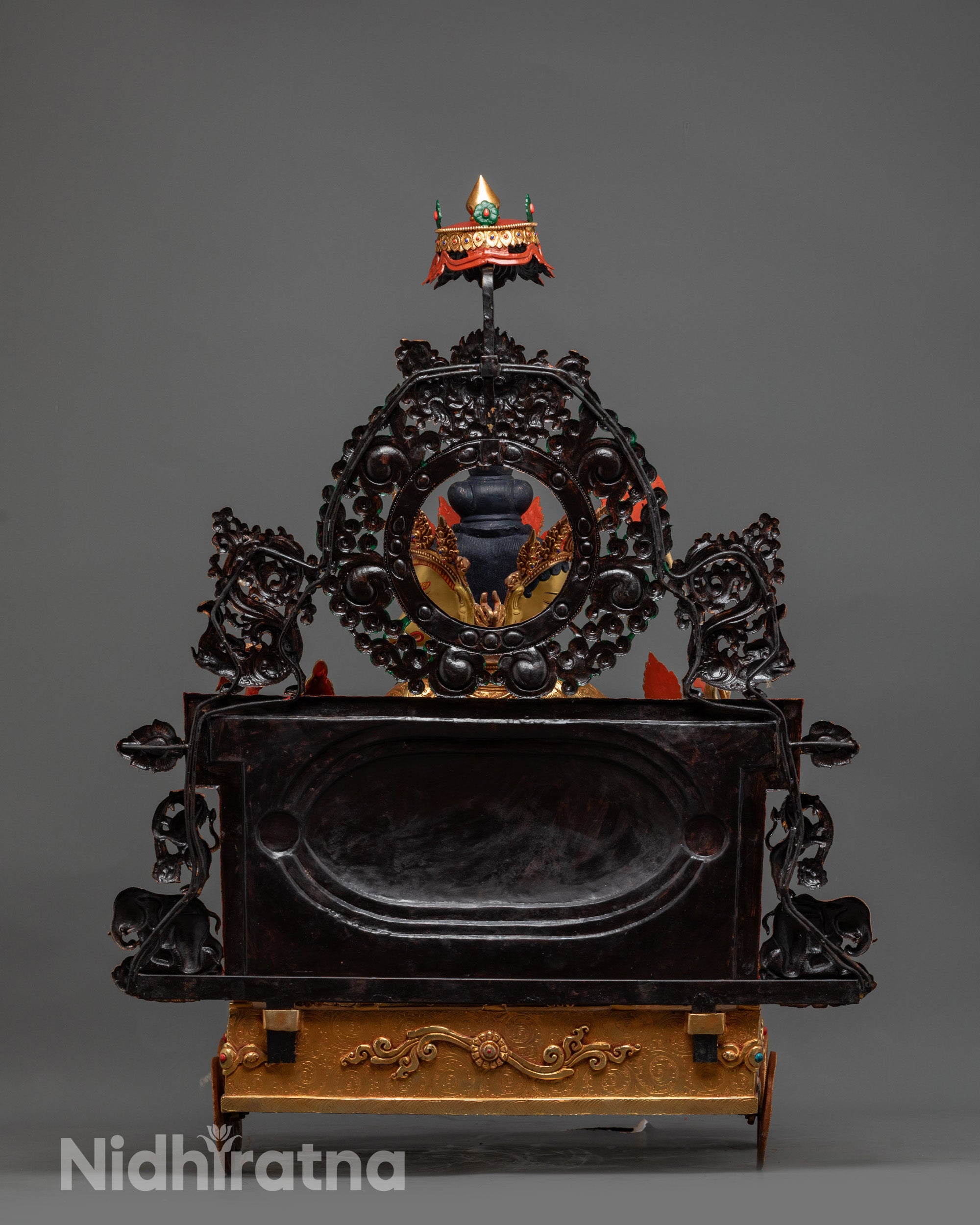 Back view of Marichi Statue highlighting glowing halo and intricate craftsmanship