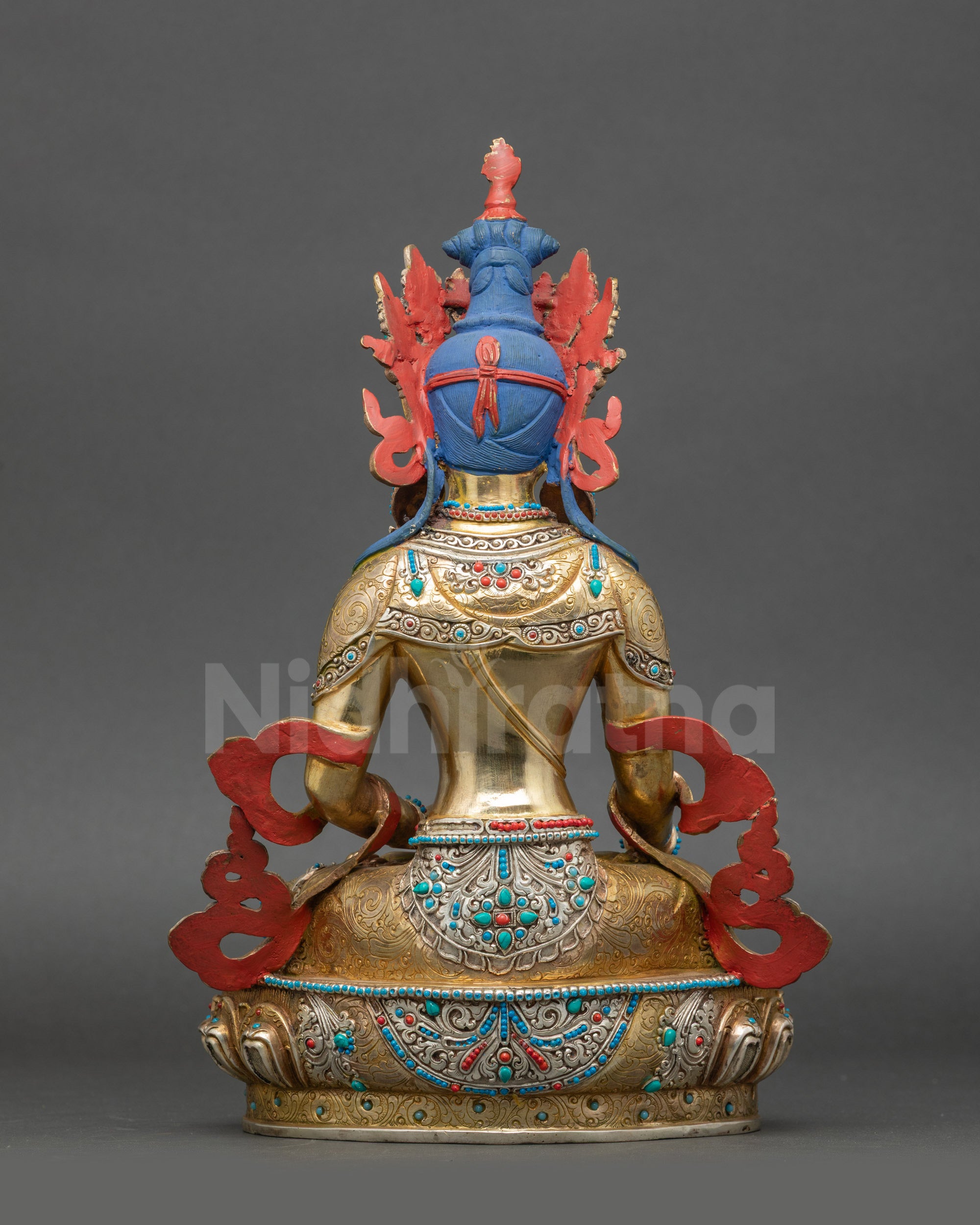 Back view of Mitrugpa Buddha Statue crafted in copper with gold fire-gilded finish Nepal