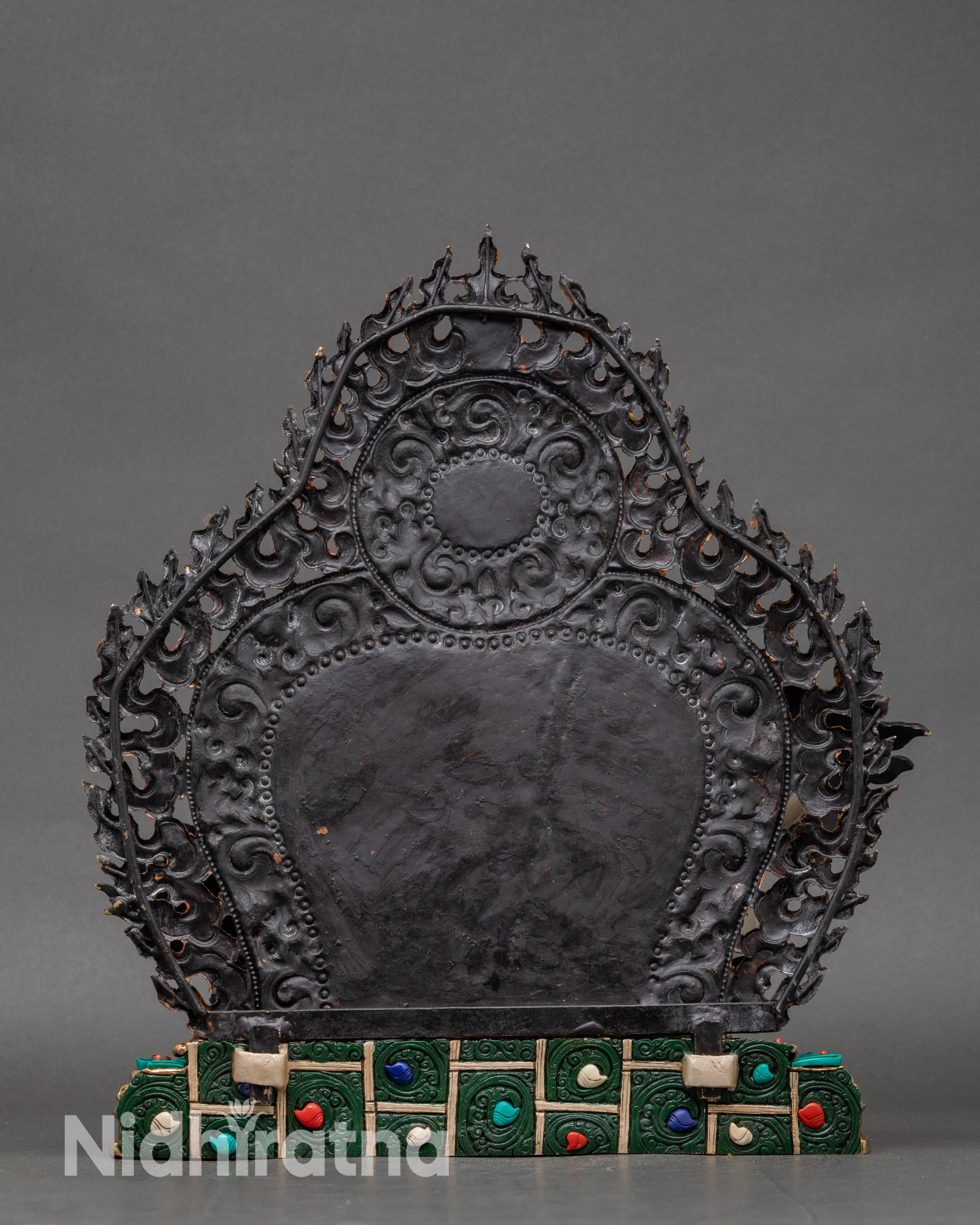 Back view of Namtoshe statue, detailed robes, hand-painted halo, and copper craftsmanship