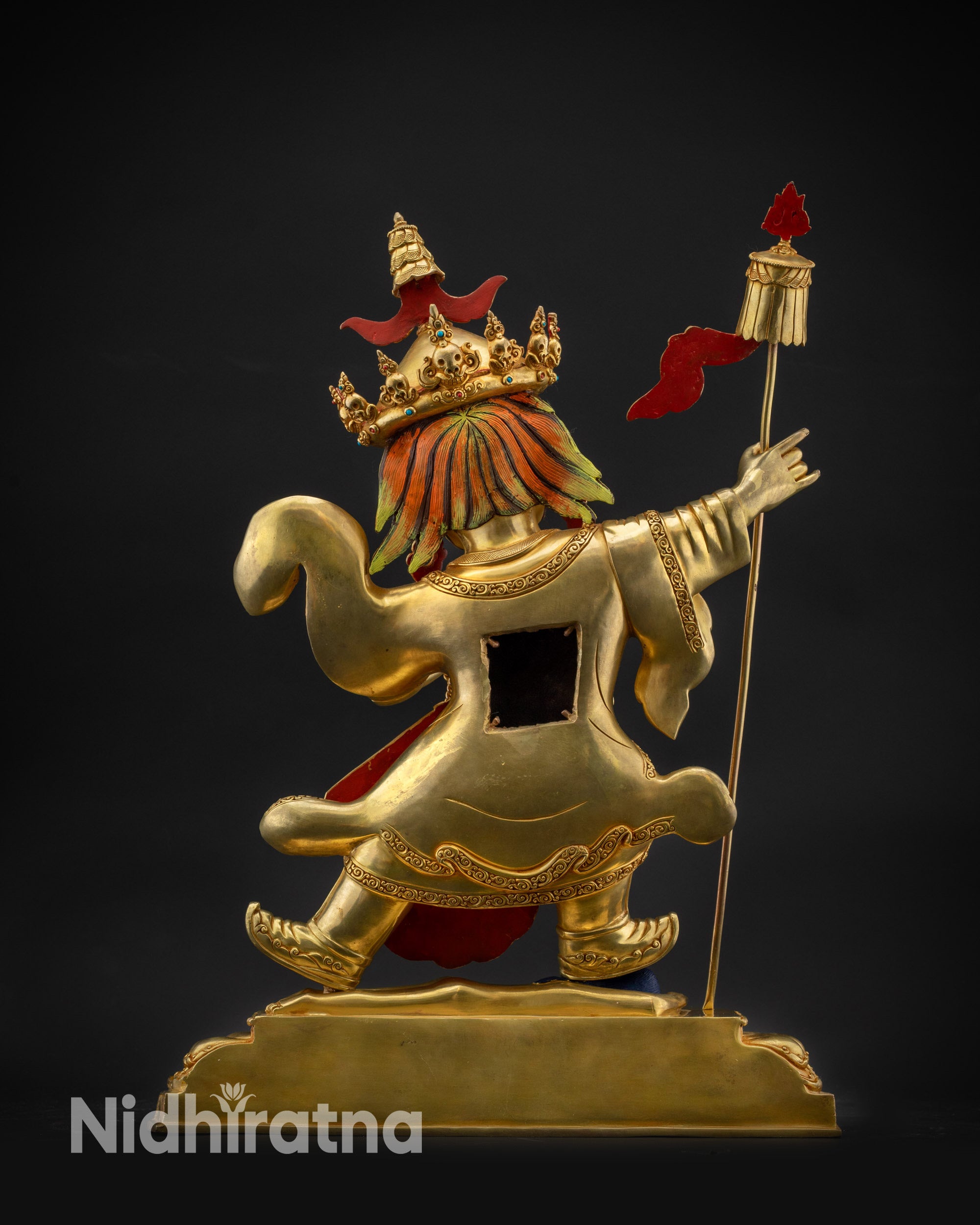 Back view of Nechung Chuyong Statue showing monastic robe and detailed back carving