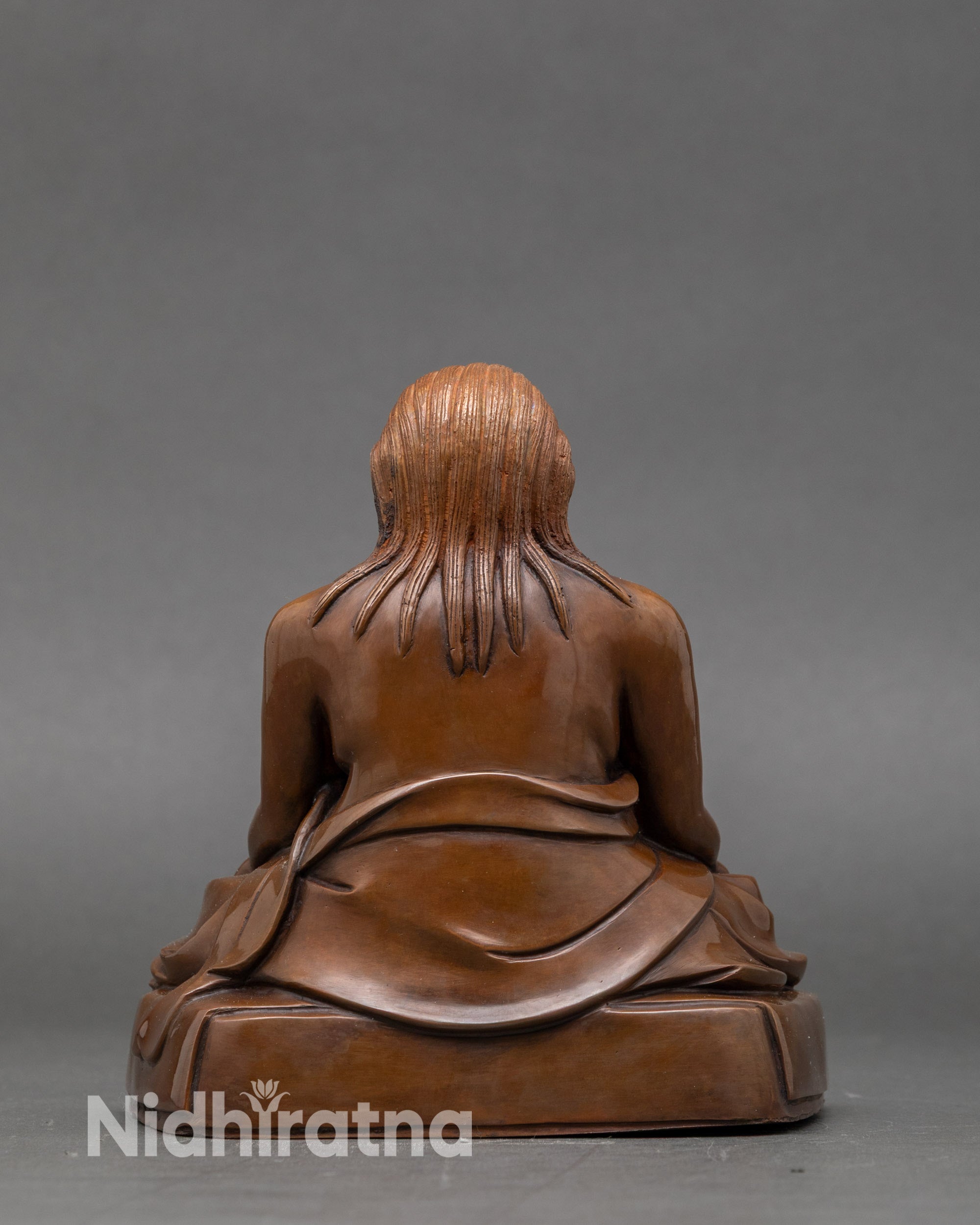 Back view of Nepalese Dilgo Khyentse Rinpoche statue highlighting craftsmanship details