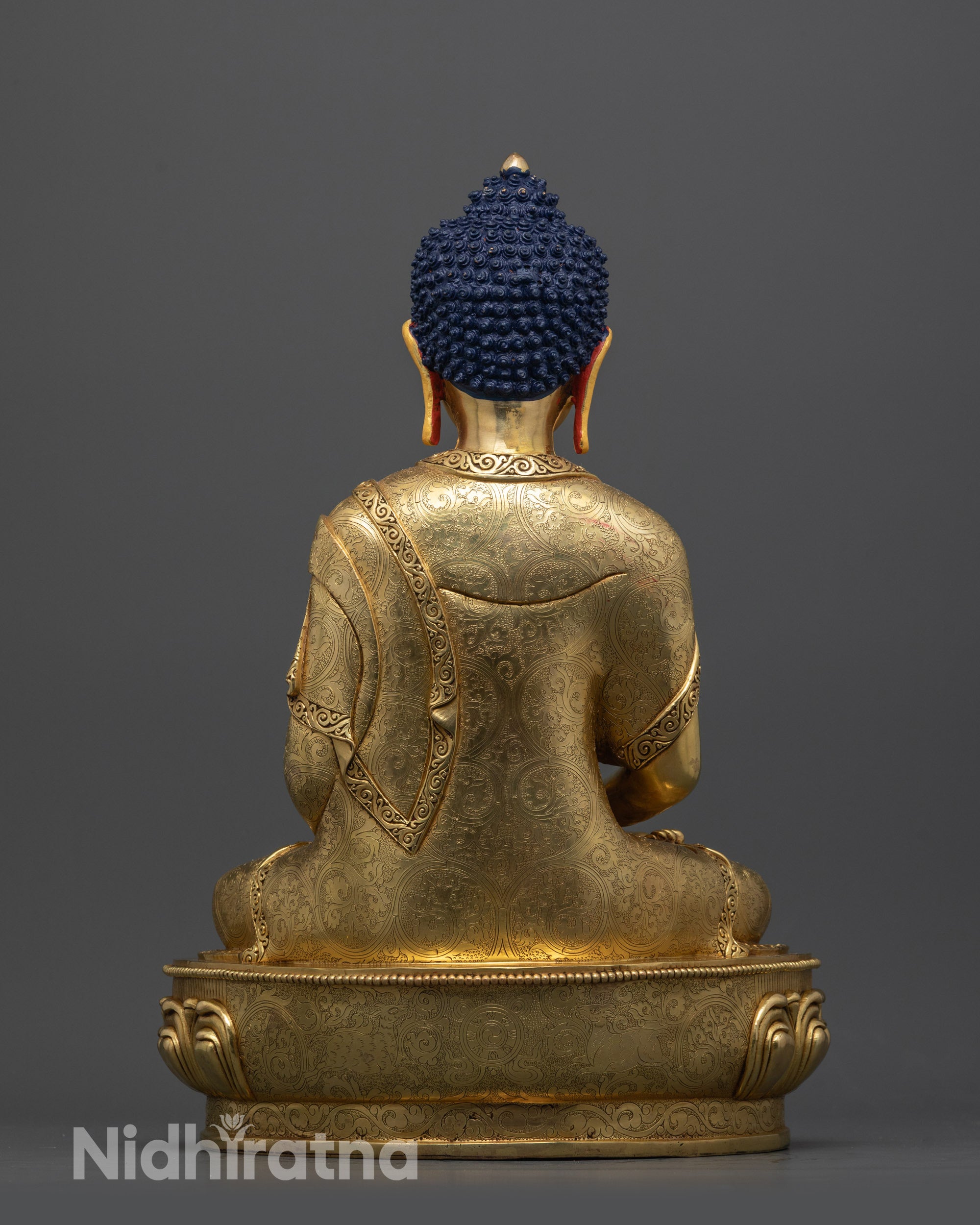 Back view of Nepalese Pure Land Buddha Statue showing polished carved robe and copper base