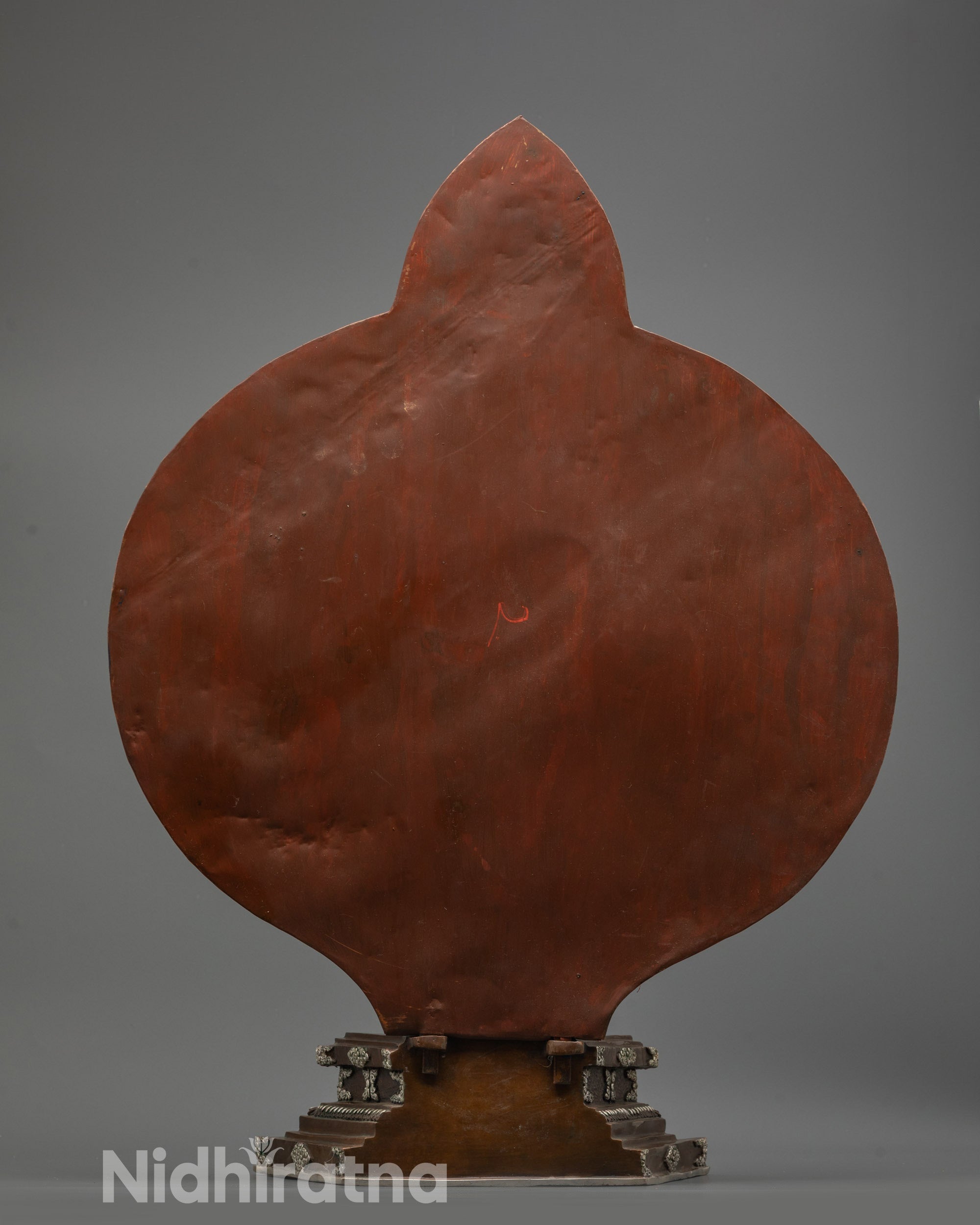 Back view of Oxidized Chenrezig Statue on lotus throne with intricate carved patterns