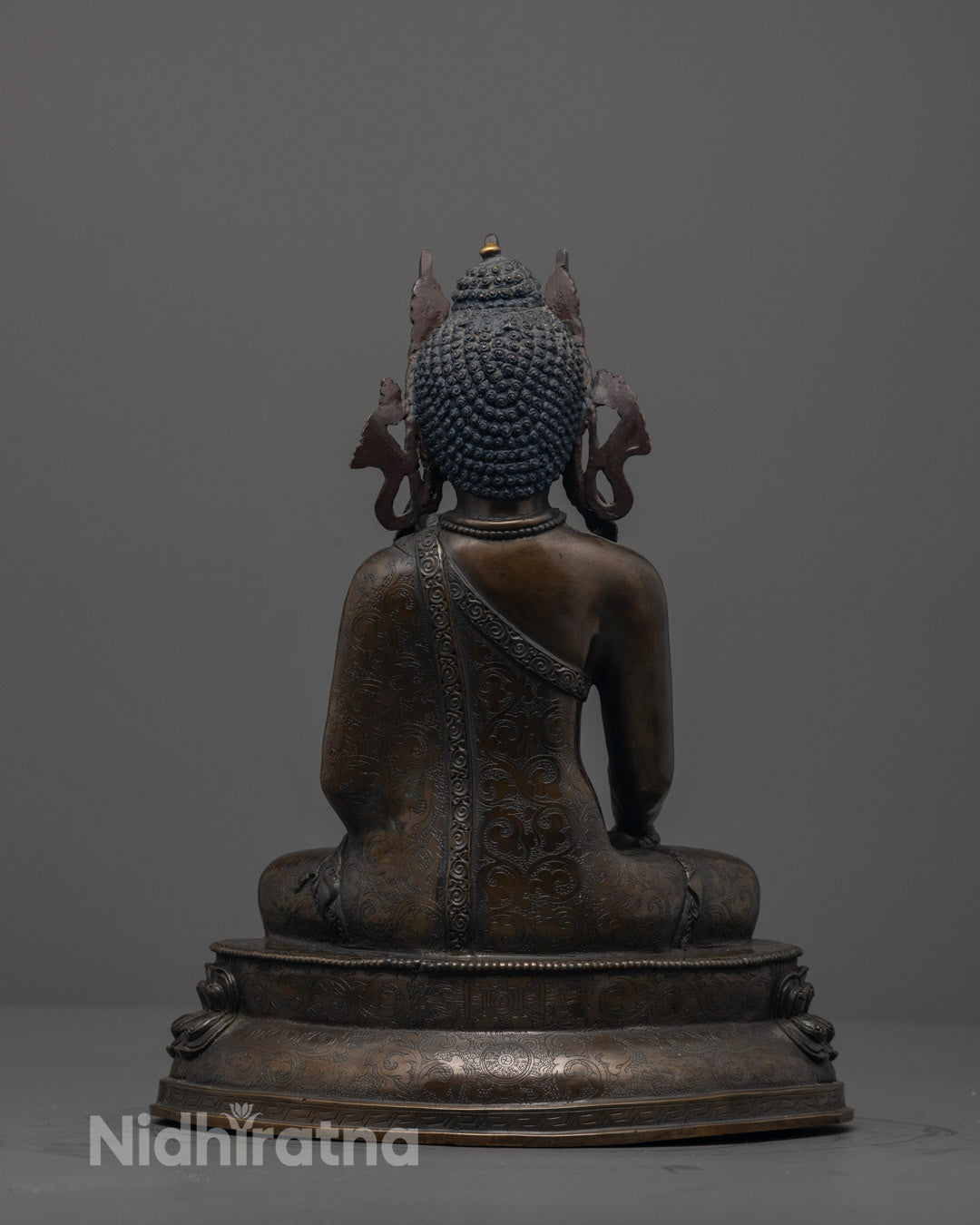 Back view of Serene Shakyamuni Buddha statue handcrafted in Patan, Nepal,