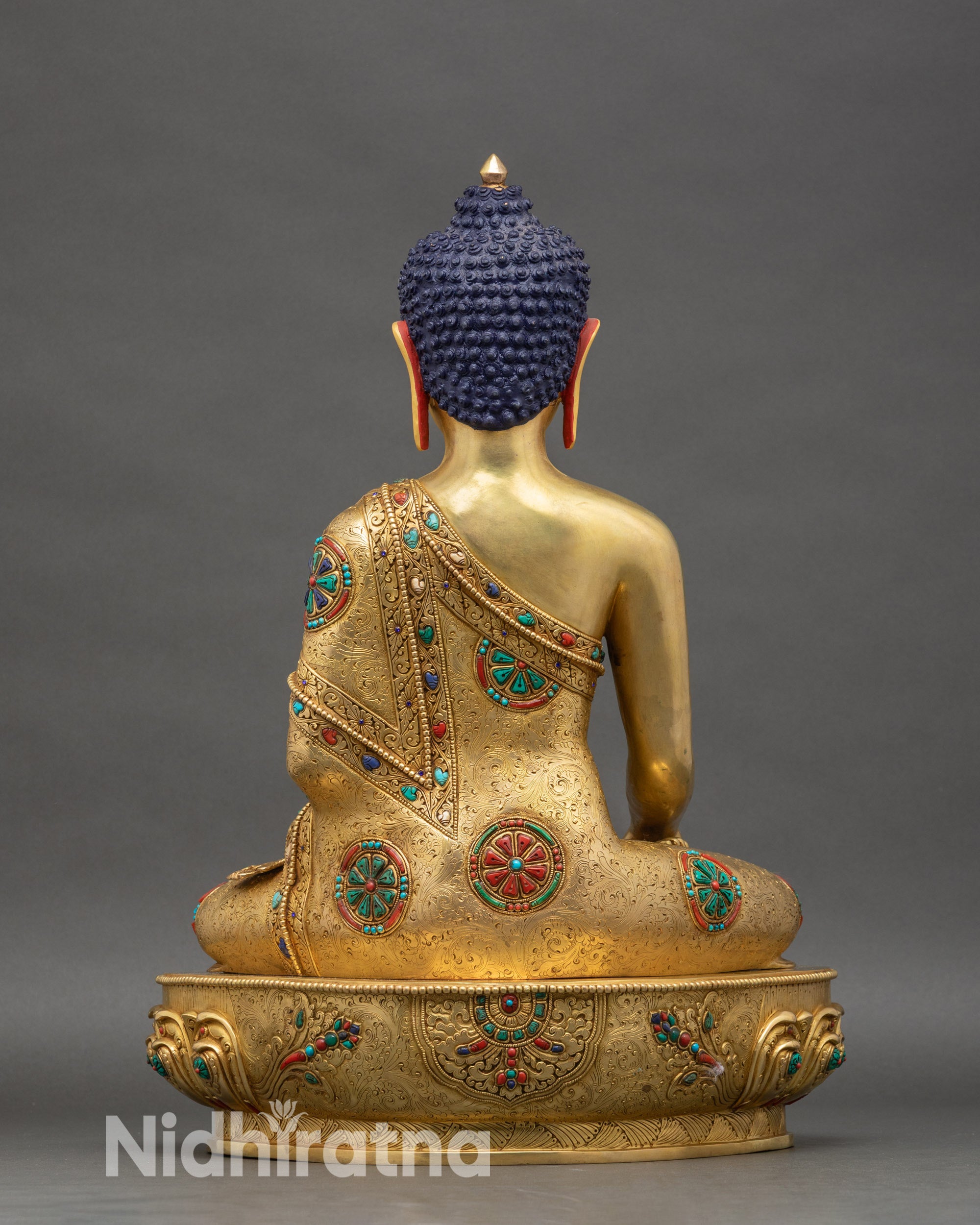 Back view of Shakyamuni Buddha, engraved lotus base and traditional artisan work