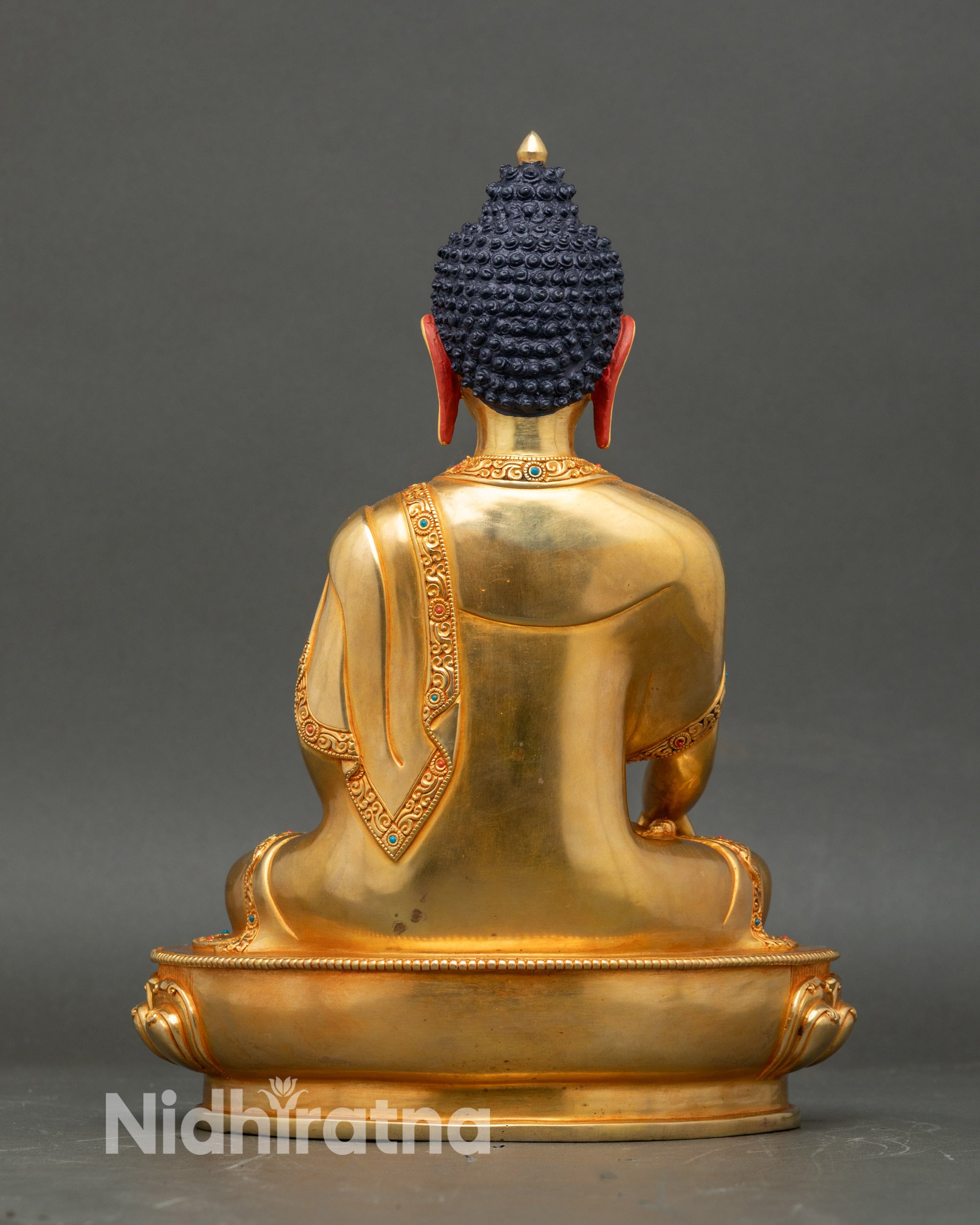 Back view of Shakyamuni Buddha statue, lotus seat and gold fire-gilded copper