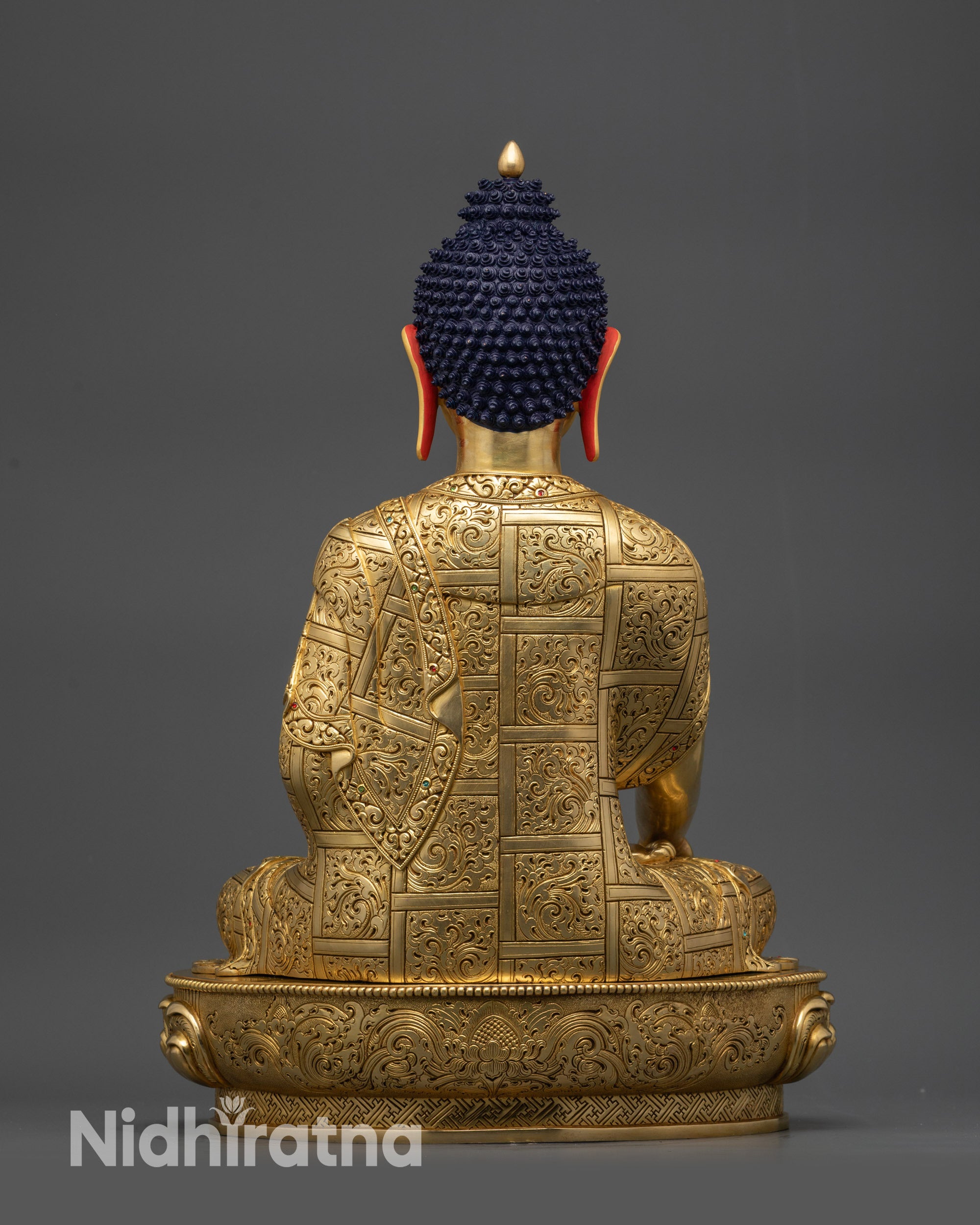 Back view of Tathagata Buddha Statue showing intricate robe patterns and details