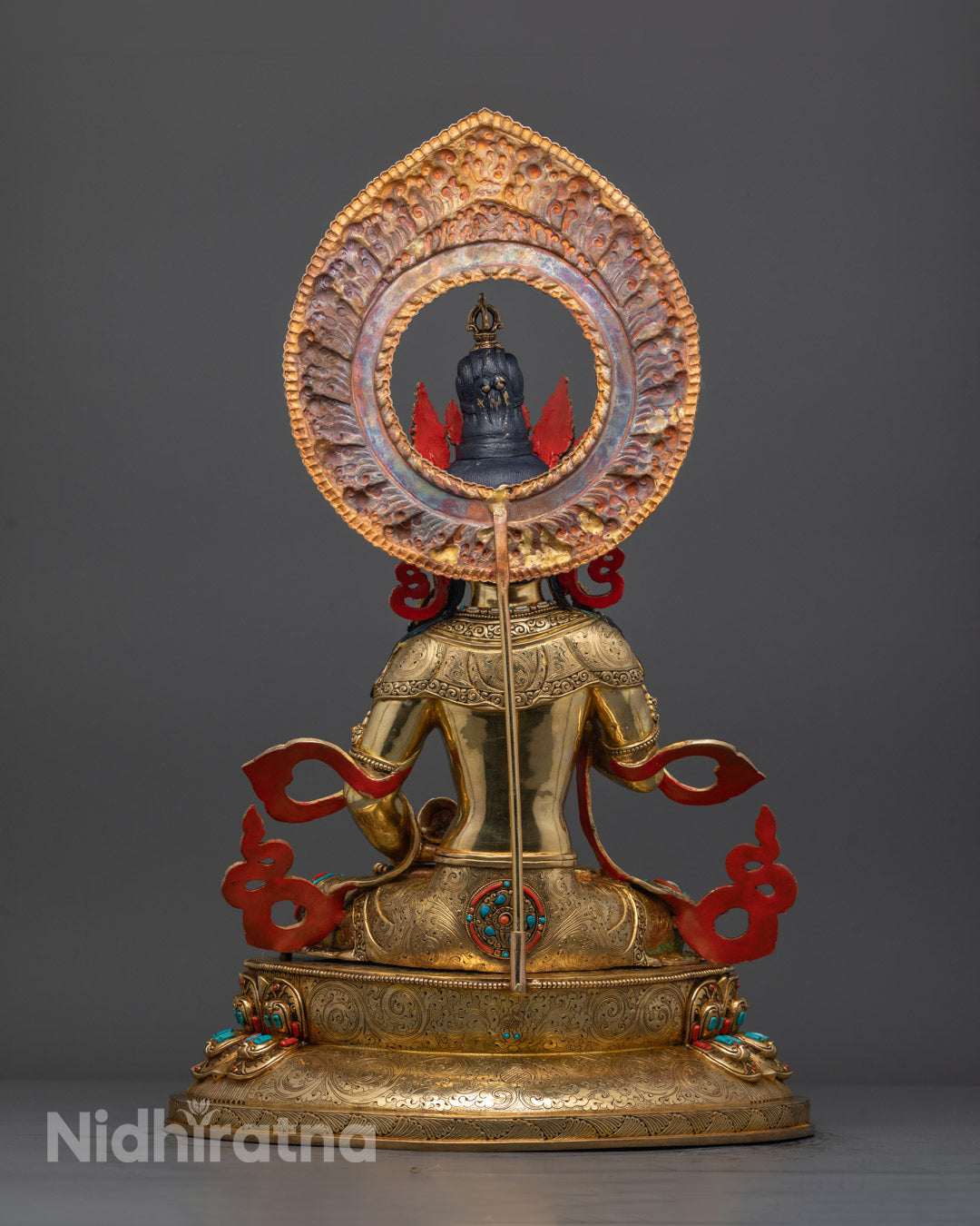 Back view of Vajra Hero Dorje Sempa Statue with detailed carvings and jeweled crown