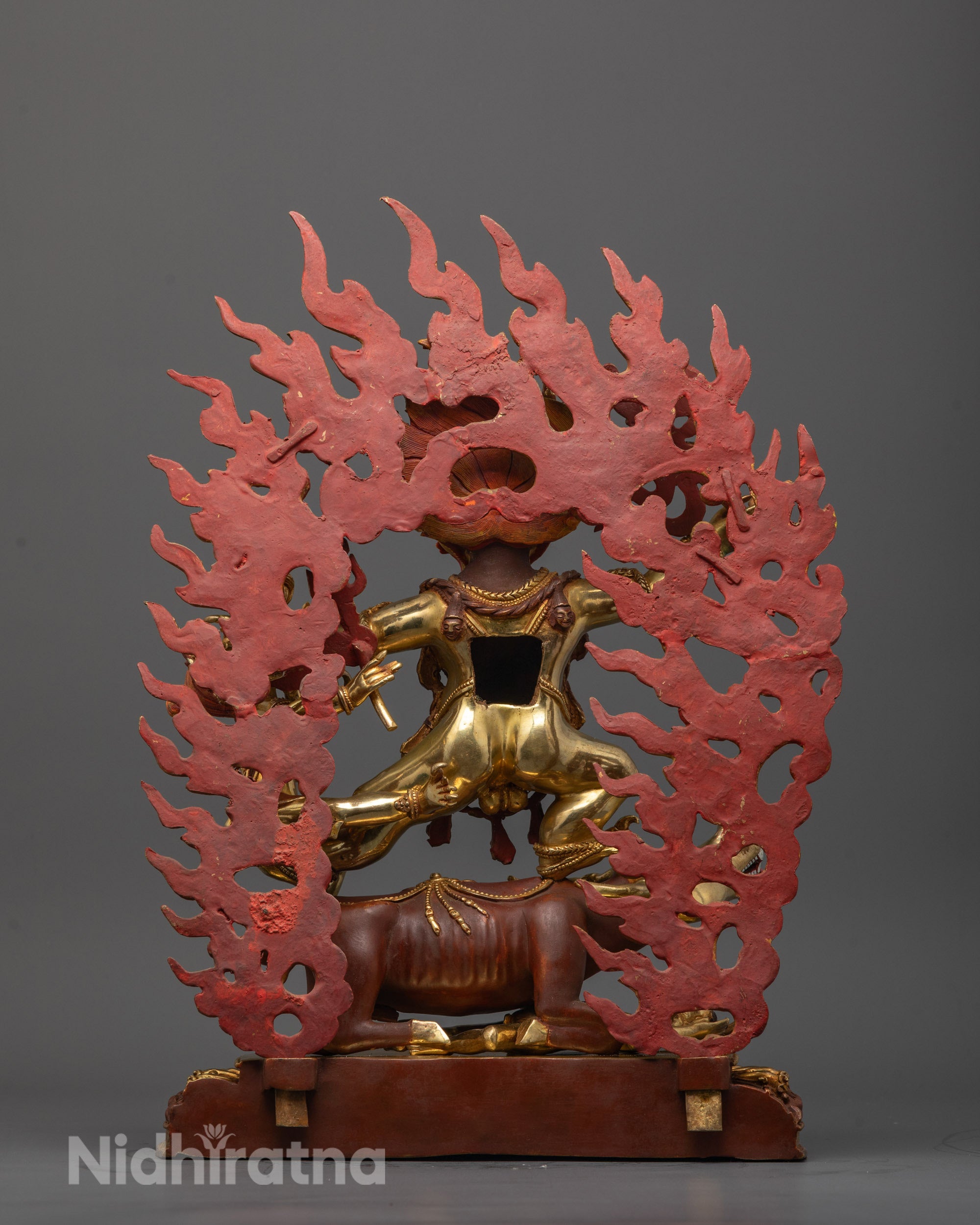 Back view of Vajrabhairava Yamantaka sculpture highlighting ornate patterns and halo details