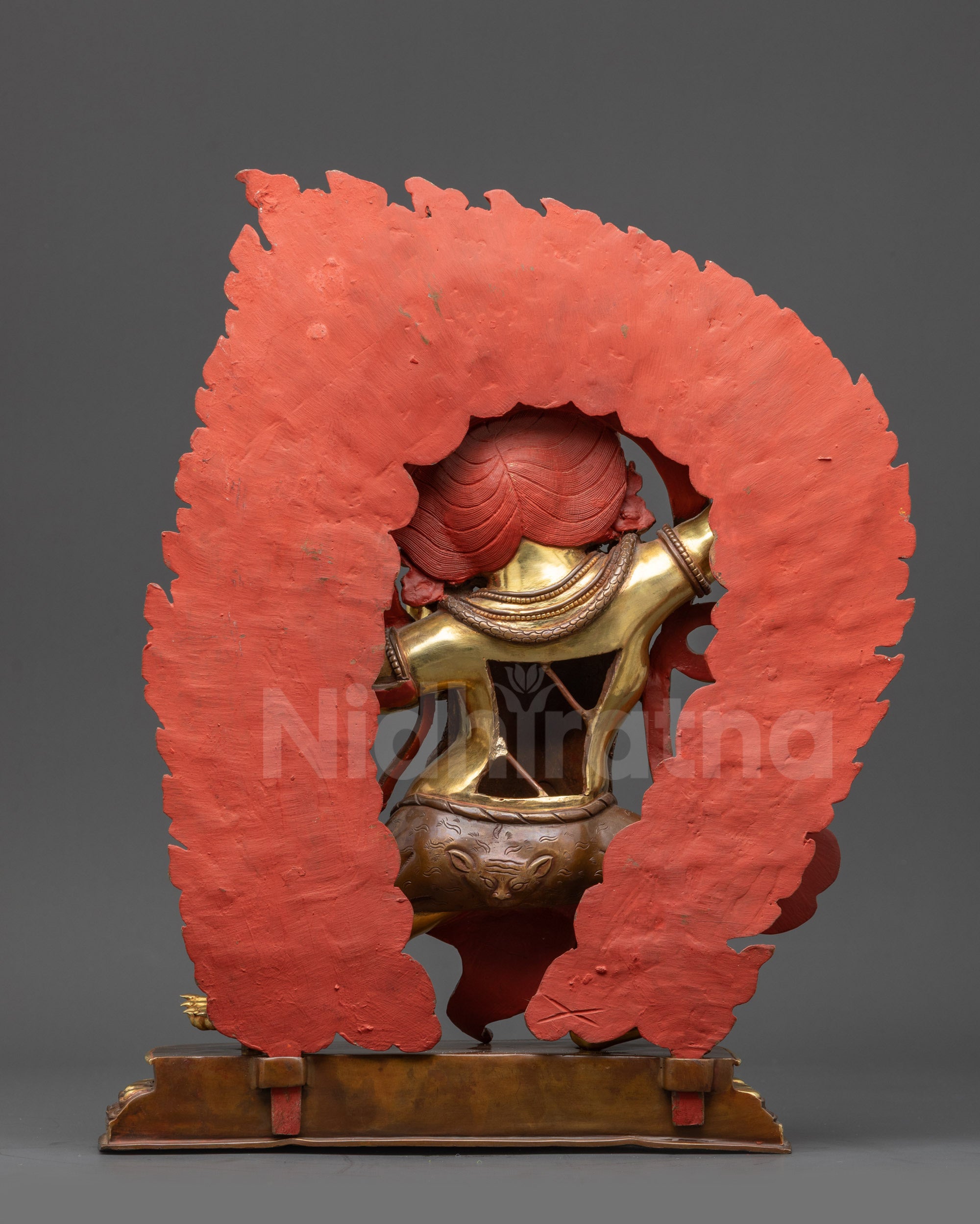 Back view of Vajrapani Himalayan protector statue showing intricate craftsmanship