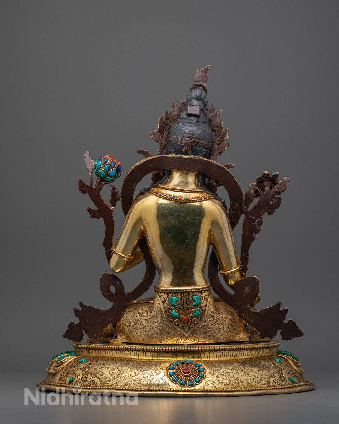 Back view of White Tara Statue showing intricately crafted halo and fine oxidized copper