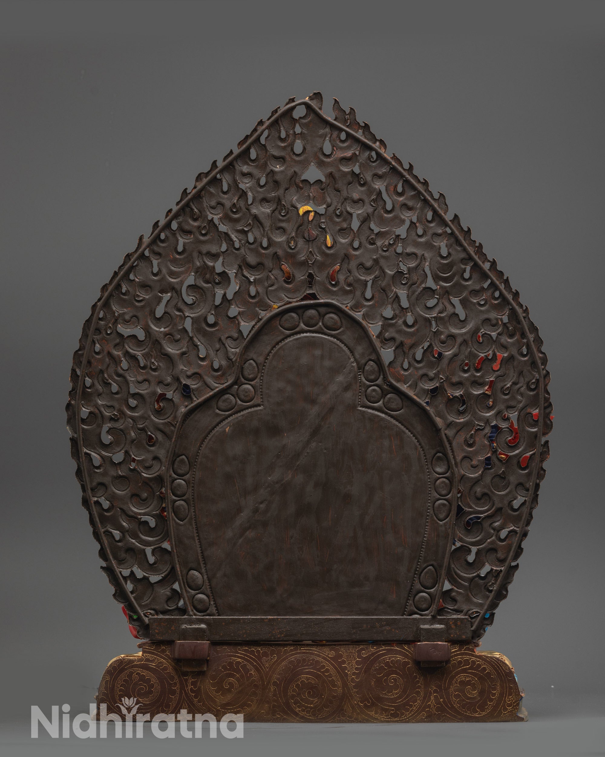 Back view of Yamantaka Statue highlighting blazing halo and intricate carvings