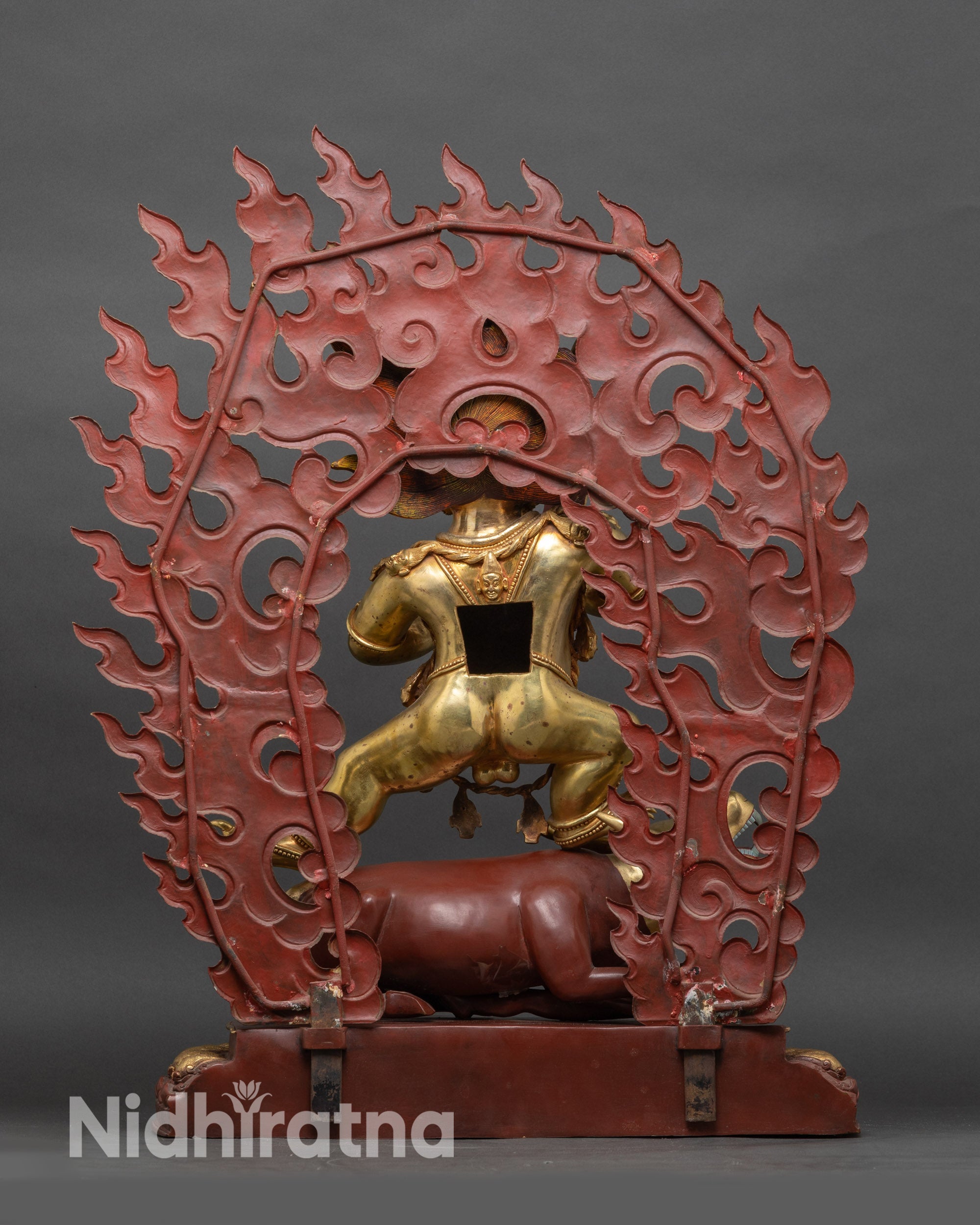 Back view of Yamantaka Vajrabhairava statue showing intricate halo