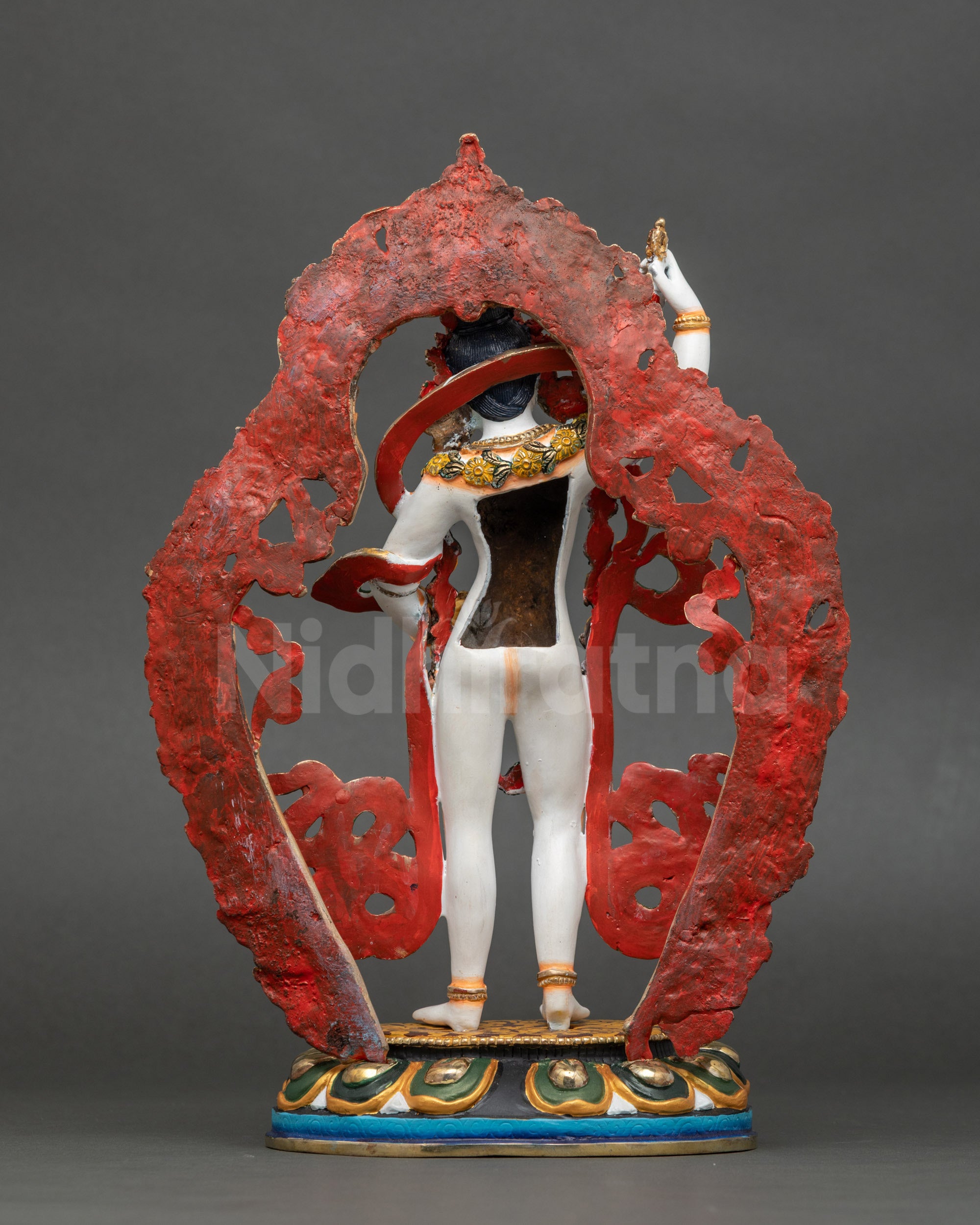 Back view of Yeshe Tsogyal statue showing intricate lotus seat and acrylic color details