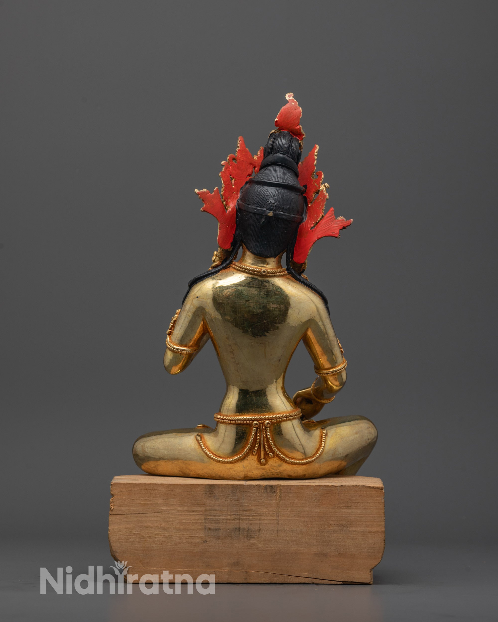 Back view of detailed Saraswati statue highlighting lost wax casting craftsmanship and artistry