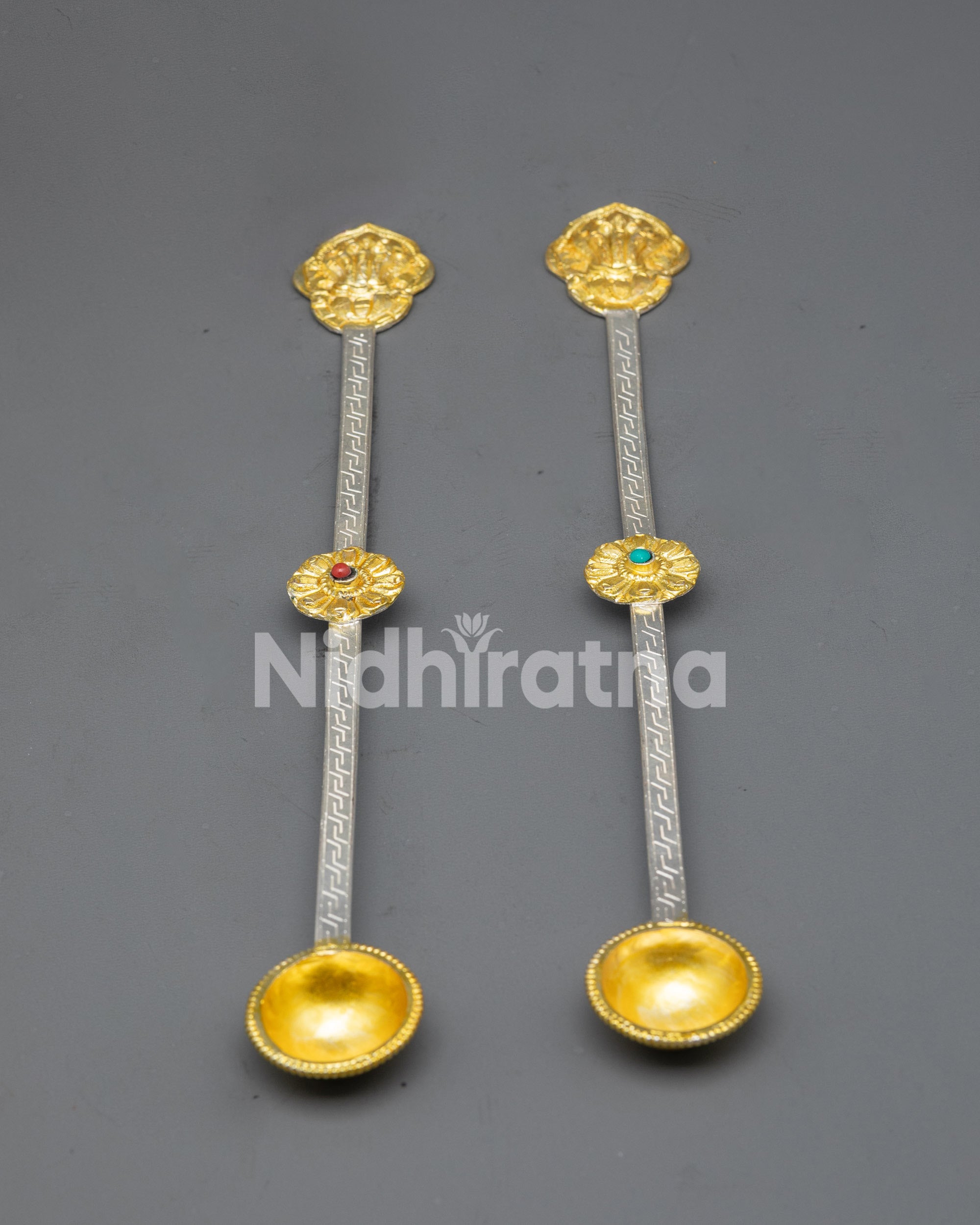 Back view of engraved Conch Shell on Tibetan altar spoon handle