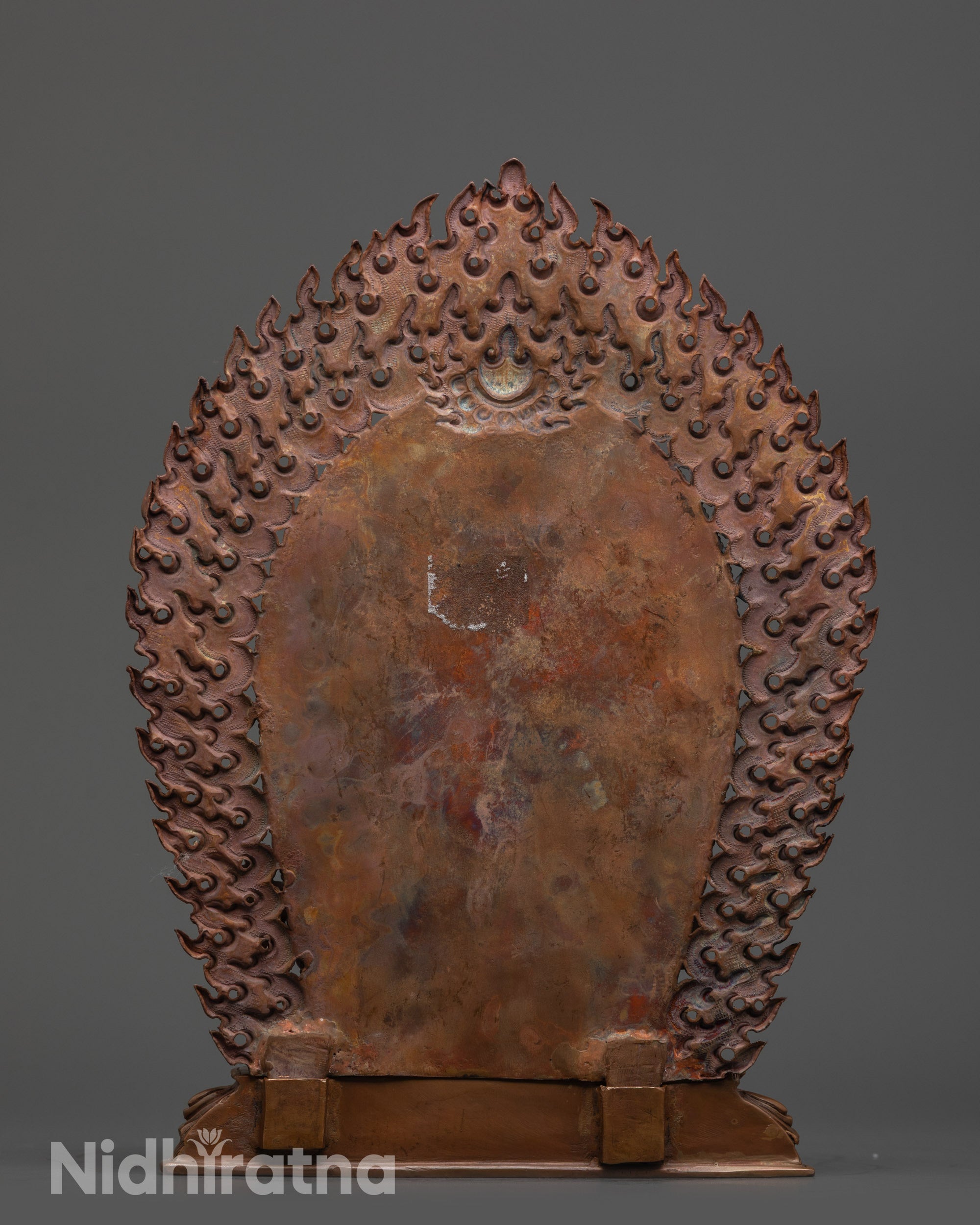 Back view of fully oxidized copper Chakrasamvara Consort Statue showing halo and carvings