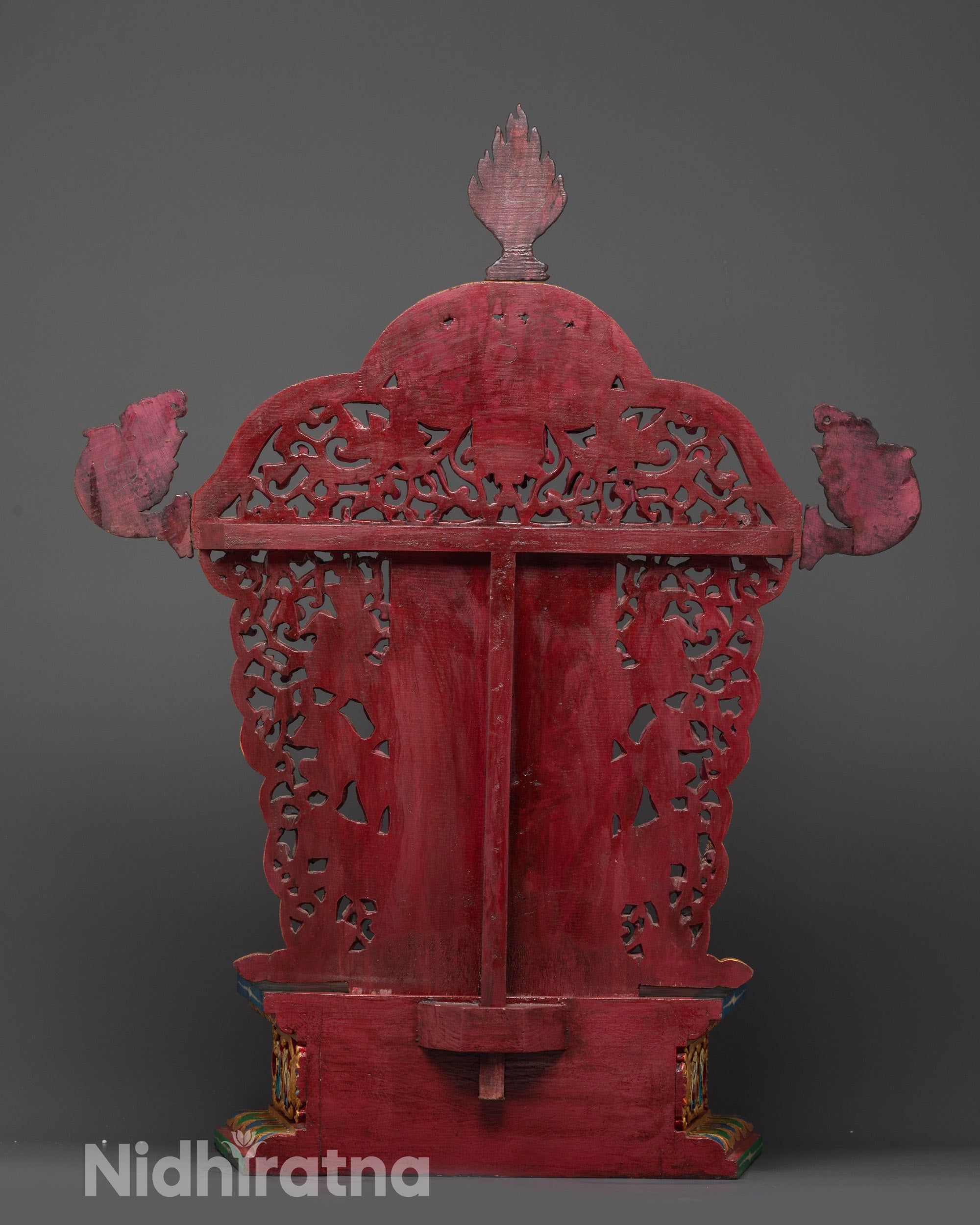 Back view of hand painted Buddhist throne carved from solid wood in Nepal