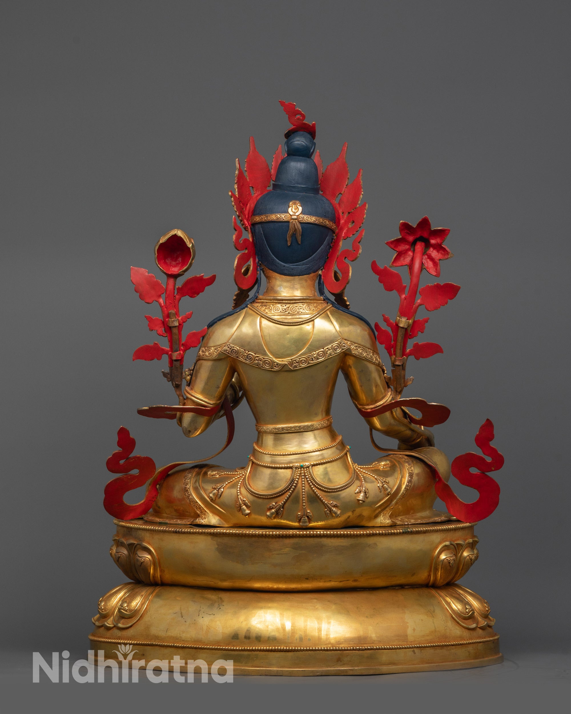 Back view of handcrafted Green Tara Statue revealing ornate details