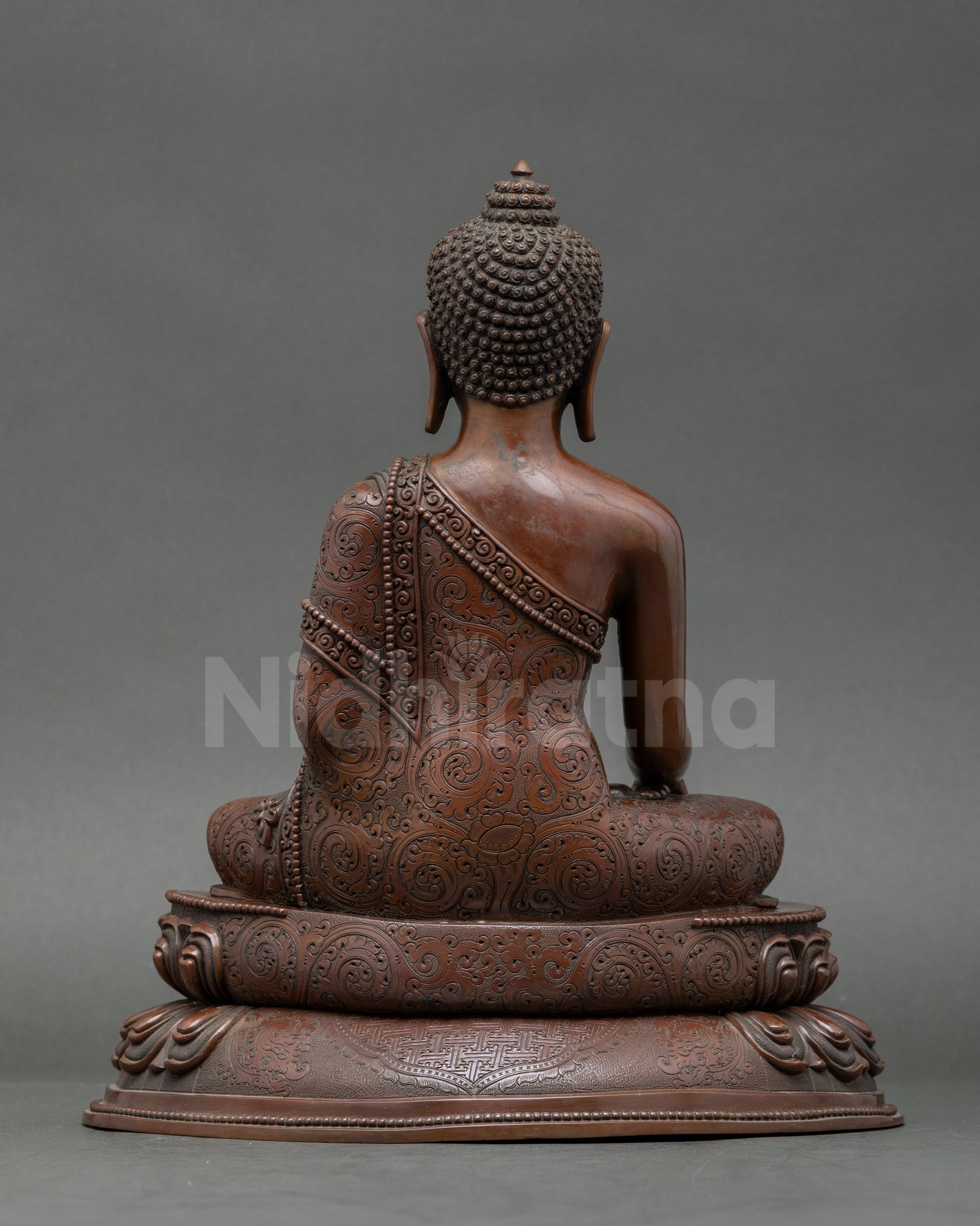 Back view of handcrafted Patan Buddha statue, perfect for home altar or meditation