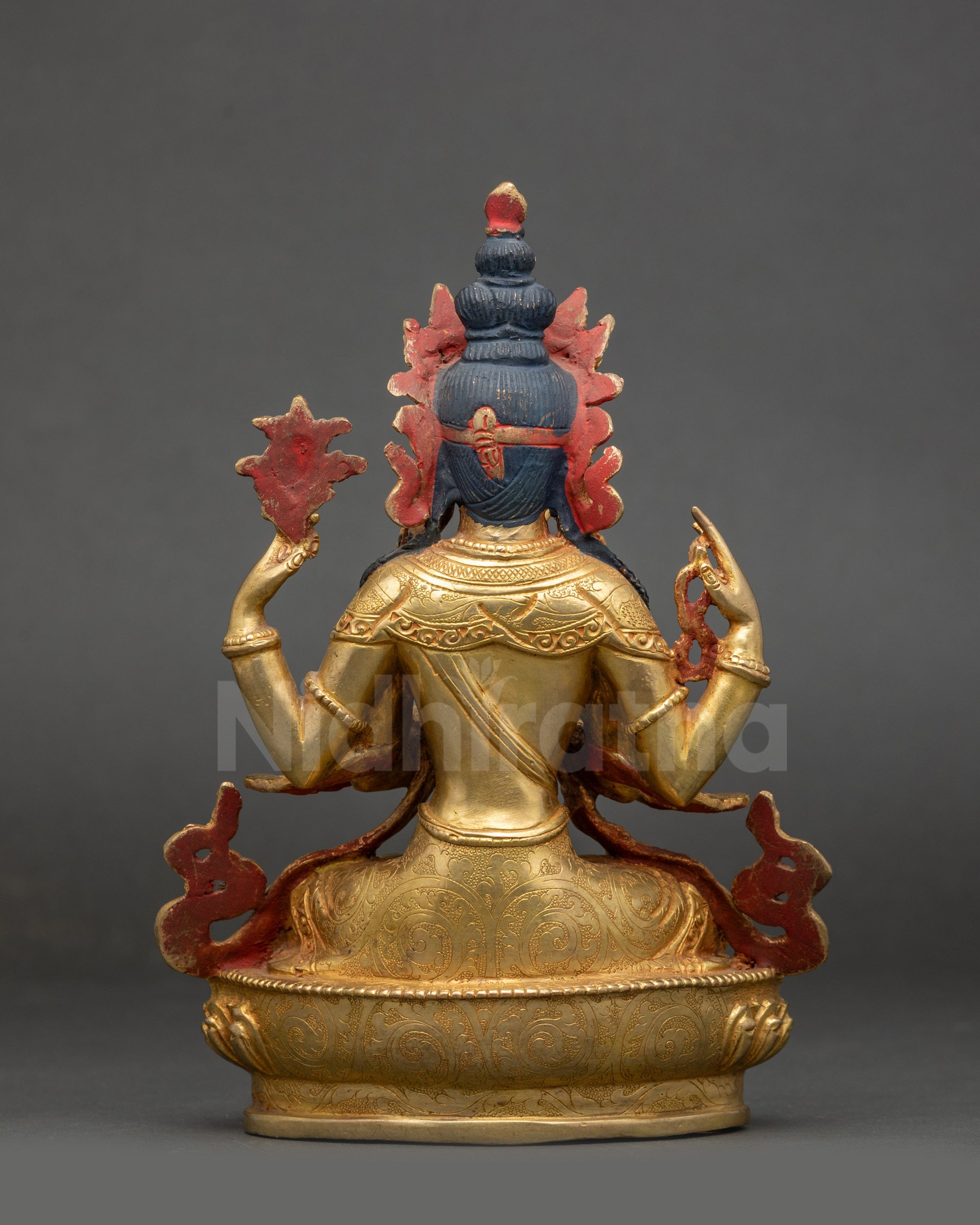 Back view of handcrafted Tibetan Chenrezig Buddha on lotus throne