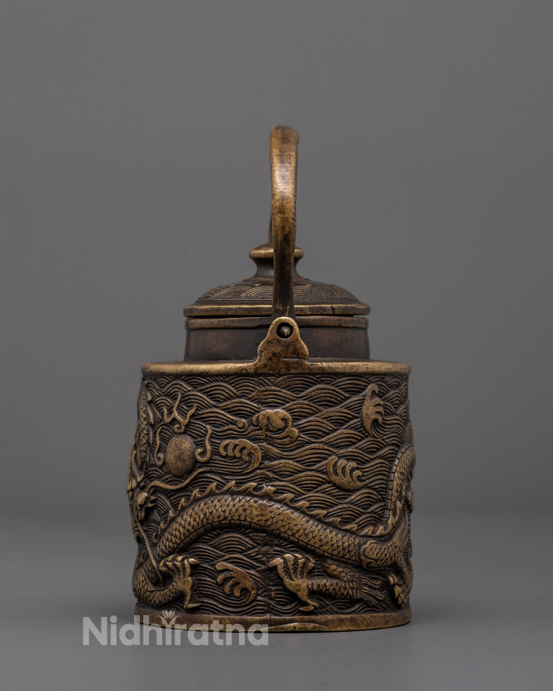Back view of handcrafted Tibetan Dragon Tea Pot made of brass and bronze