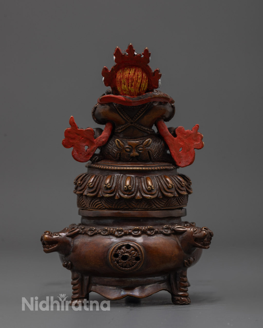 Back view of handcrafted Vajradhaka Statue with oxidized copper and flame motiftis