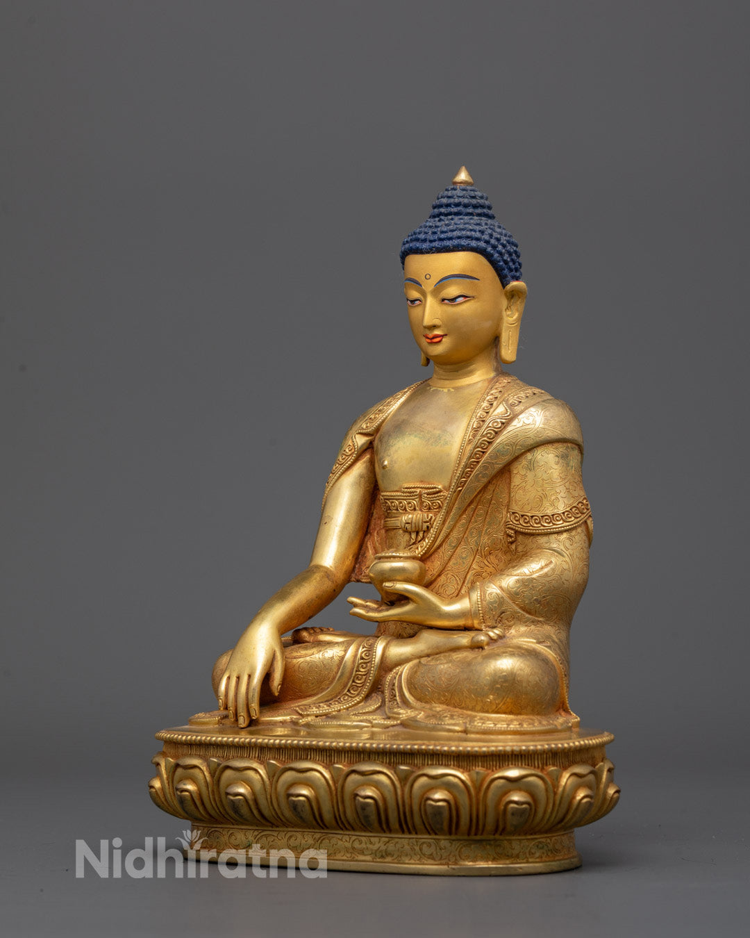 Back view of hollow base and detailed craftsmanship on Nepalese Shakyamuni Buddha statue