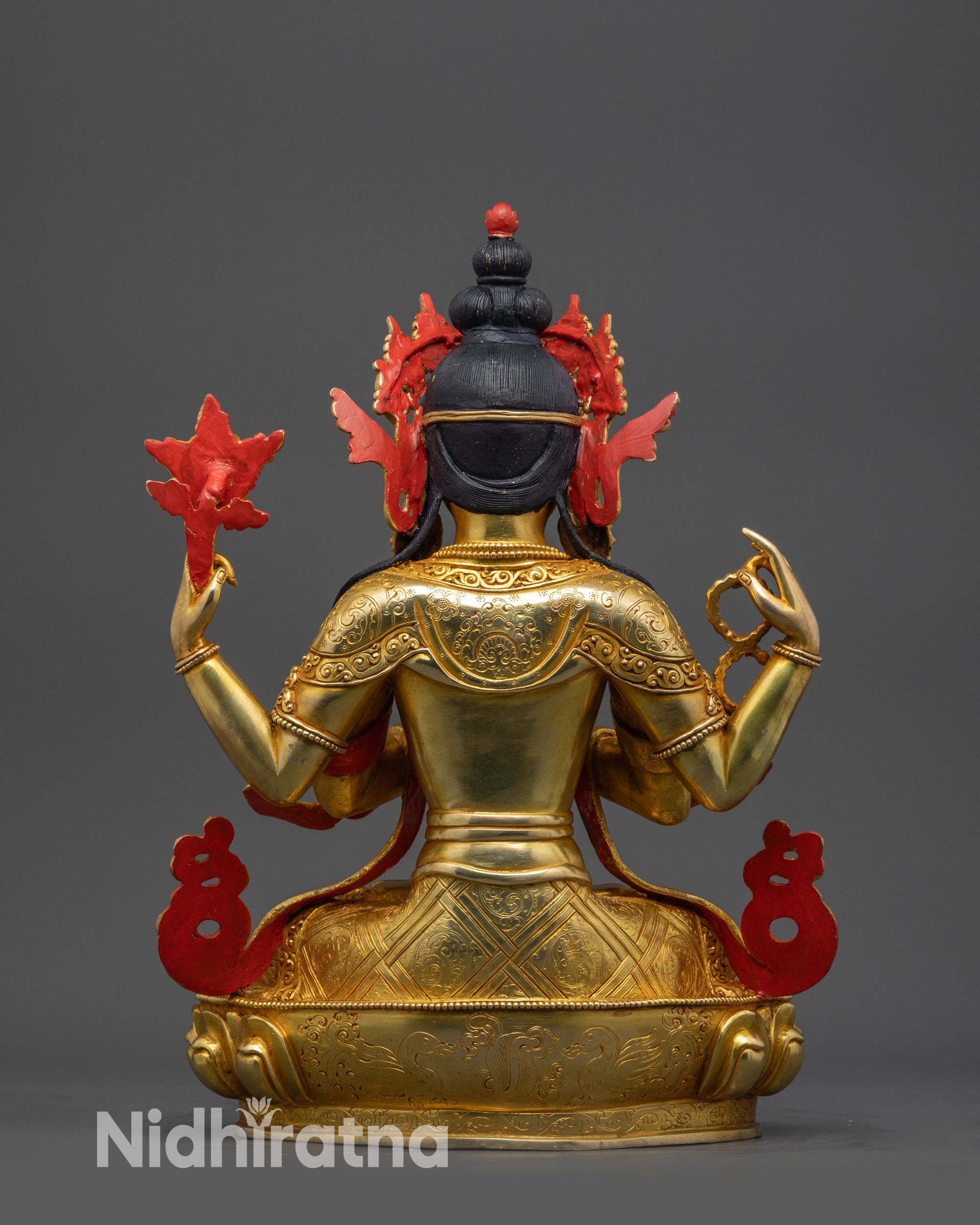 Back view of lost wax crafted Himalayan Chenrezig Statue on lotus seat